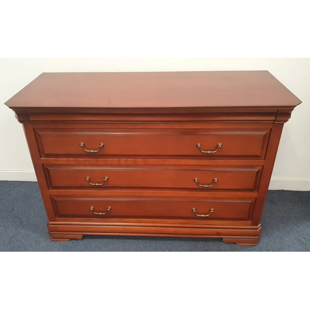 MODERN CHEST OF DRAWERS with warm mahogany veneer, featurin...