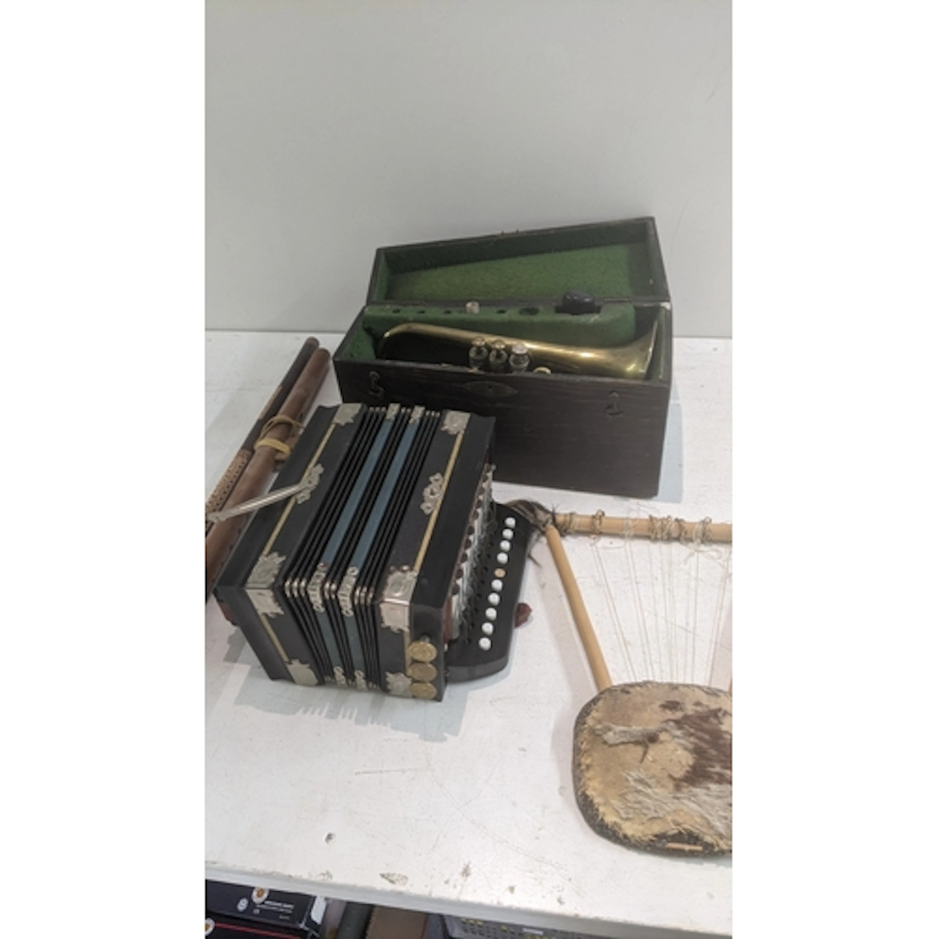 Musical instruments to include a boxed Besson and Co cornet,...