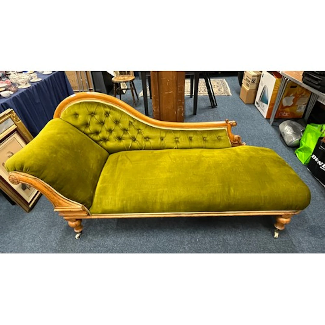 Victorian oak framed chaise longue, upholstered in green fab...