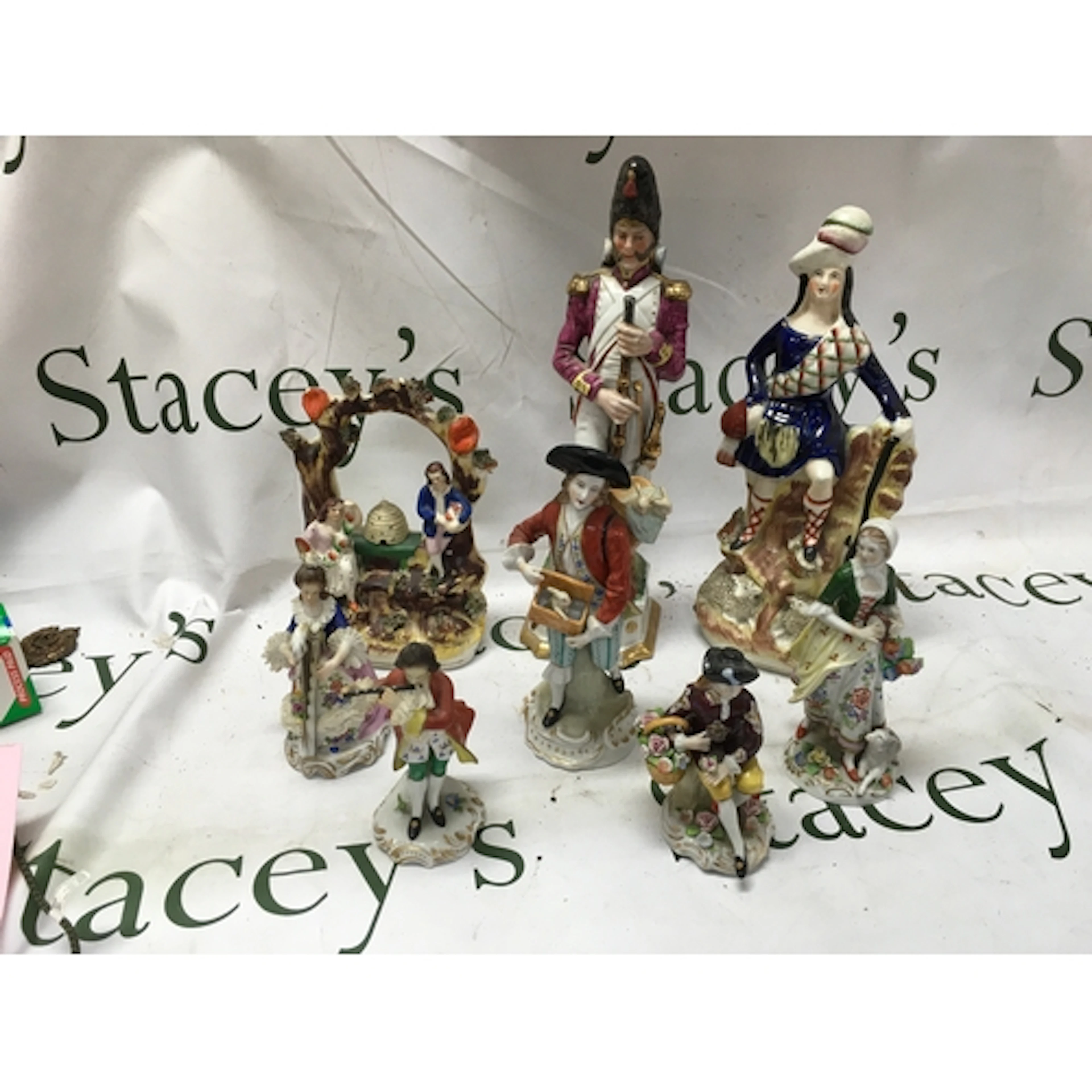Eight 19th C figurines, to include Sitzendorf pair of musici...