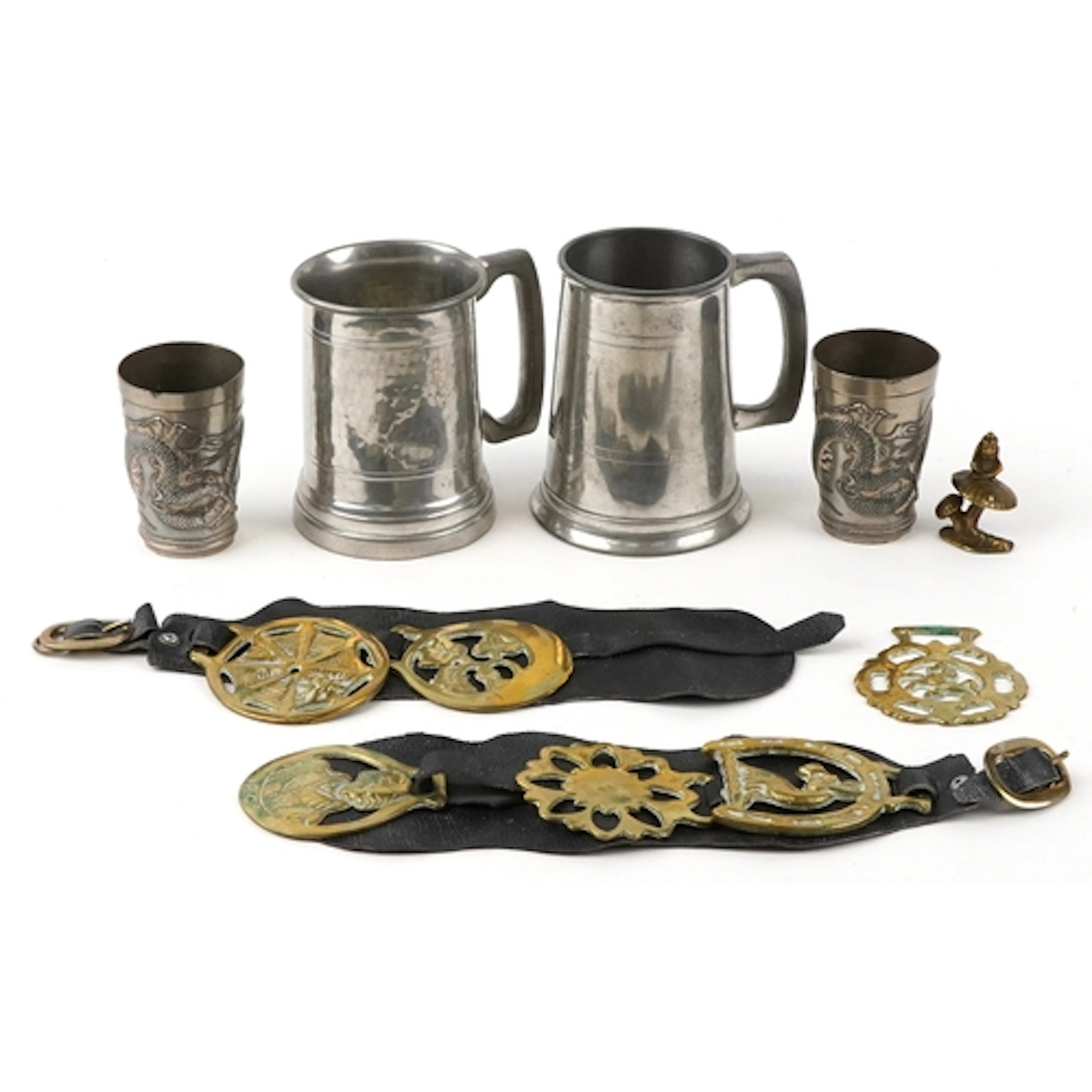 Antique and later metalware including horse brasses on leath...
