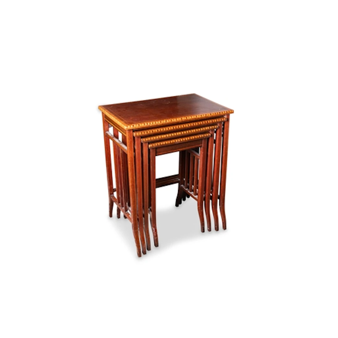 A SET OF FOUR EDWARDIAN NESTING TABLES, of inlaid, rectangul...