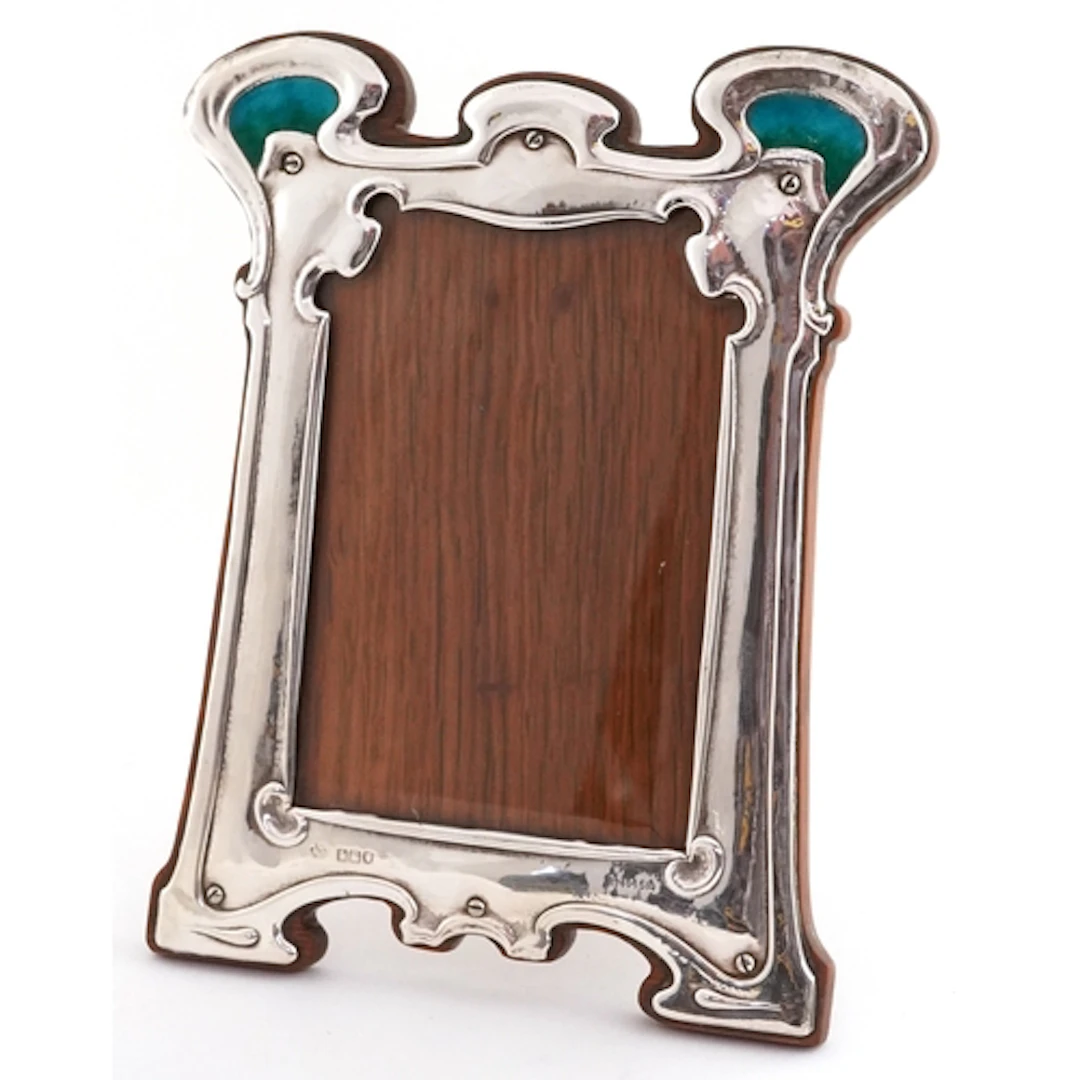 William Hutton & Sons, Art Nouveau silver, enamel and oak ea...
