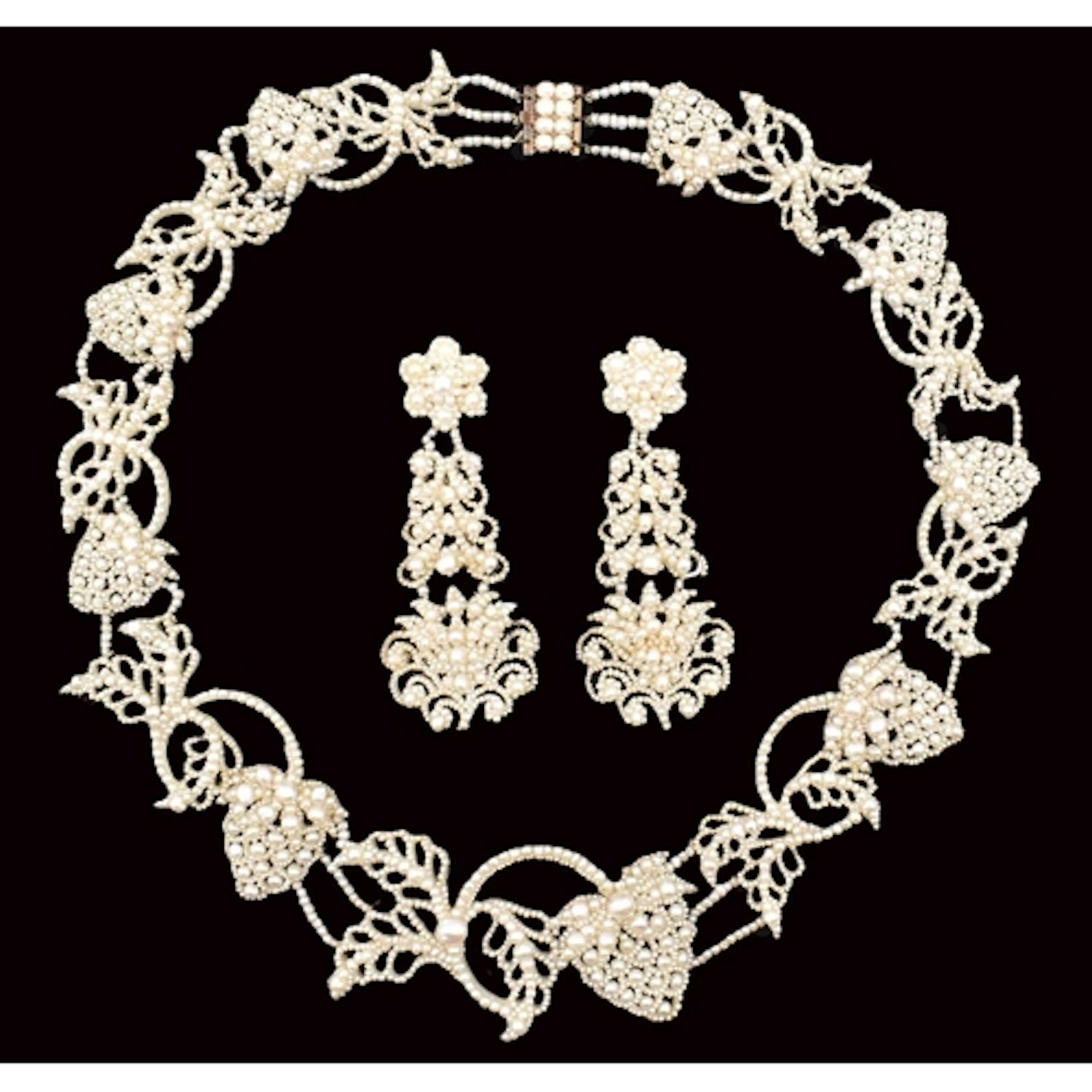 19th century cased suite of seed pearl jewellery, circa 1830...
