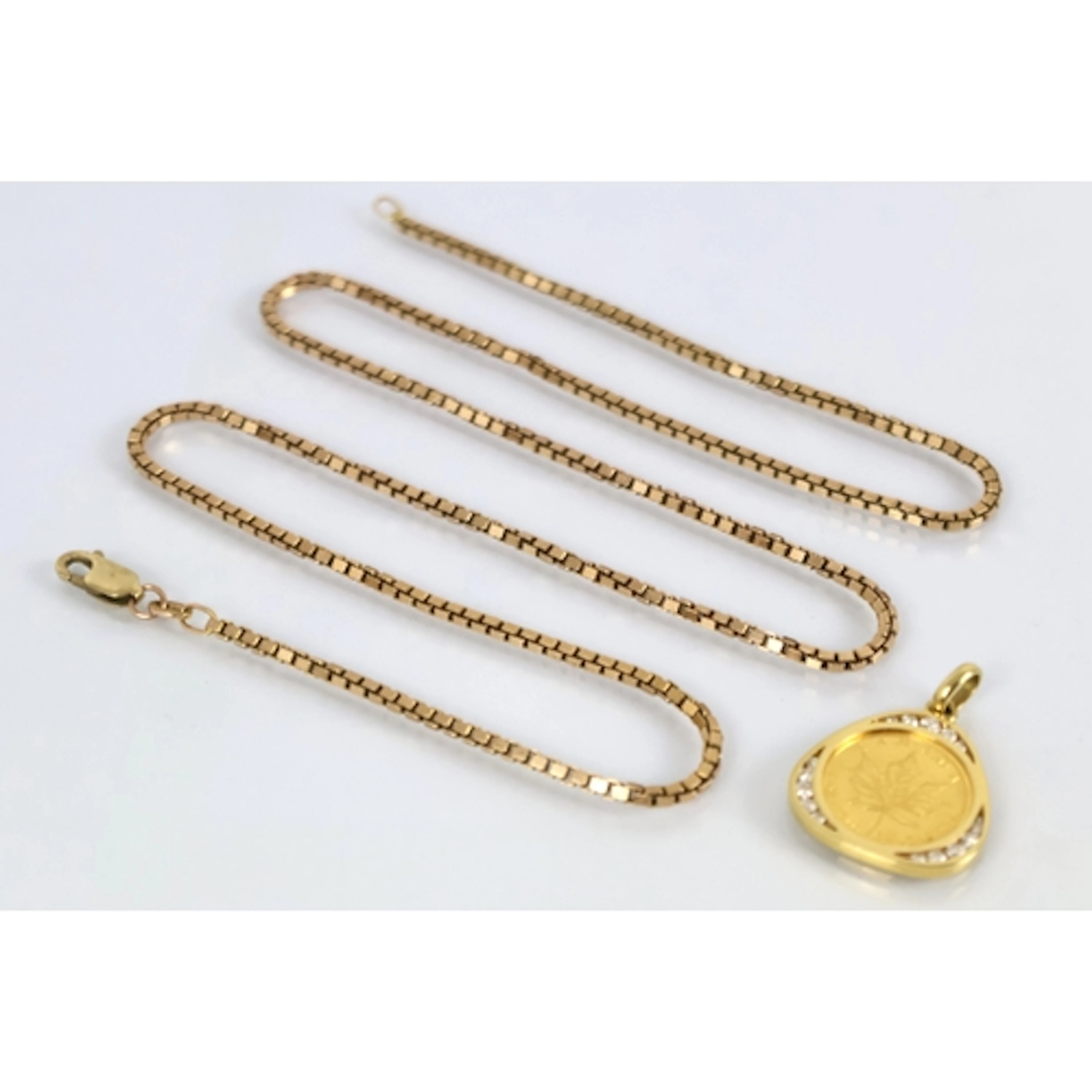 A diamond pendant set with a Canadian 5 Dollars, Elizabeth I...