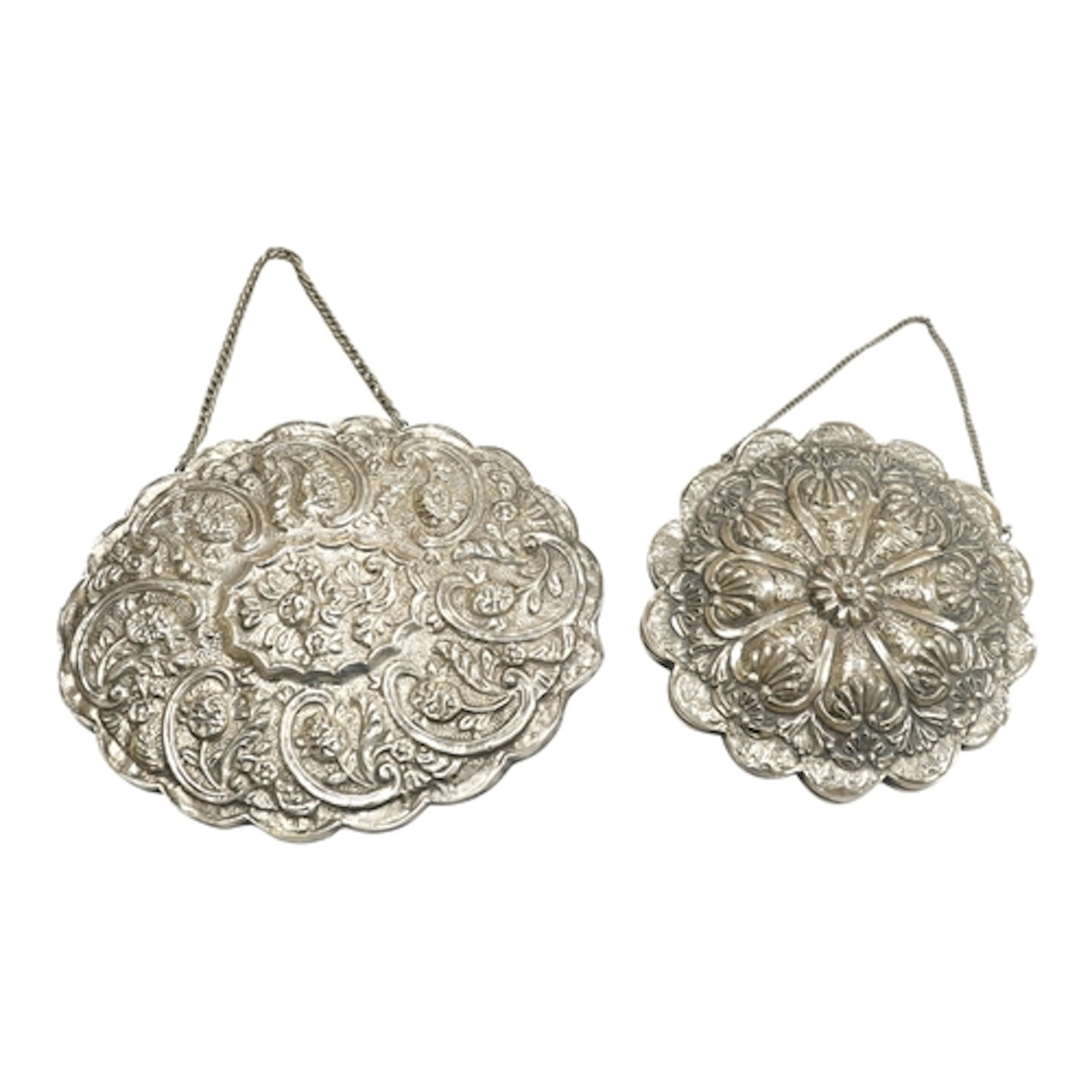 Two Turkish repousse white metal mounted oval wedding mirror...