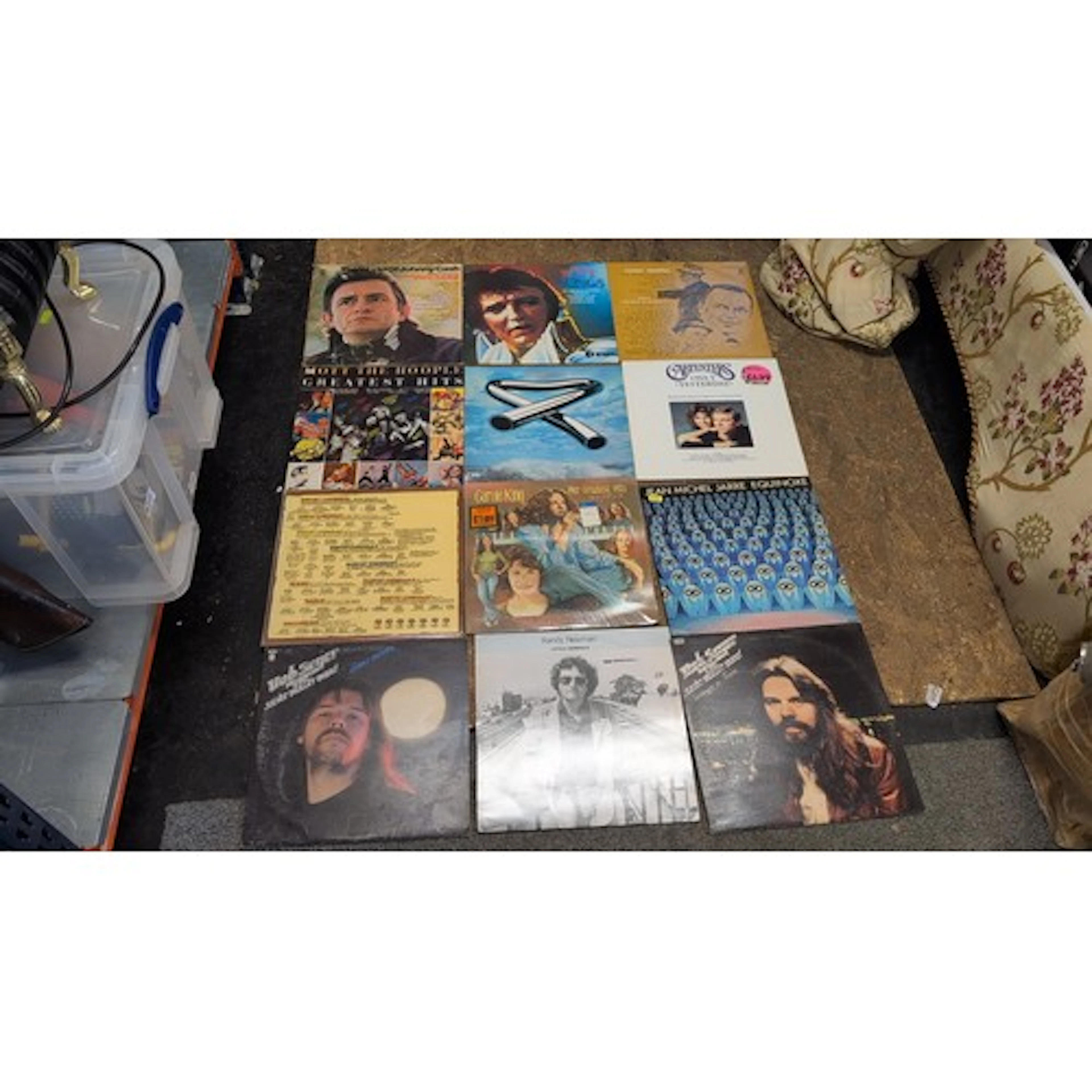 A group of LP vinyl records, including albums by Johnny Cash...