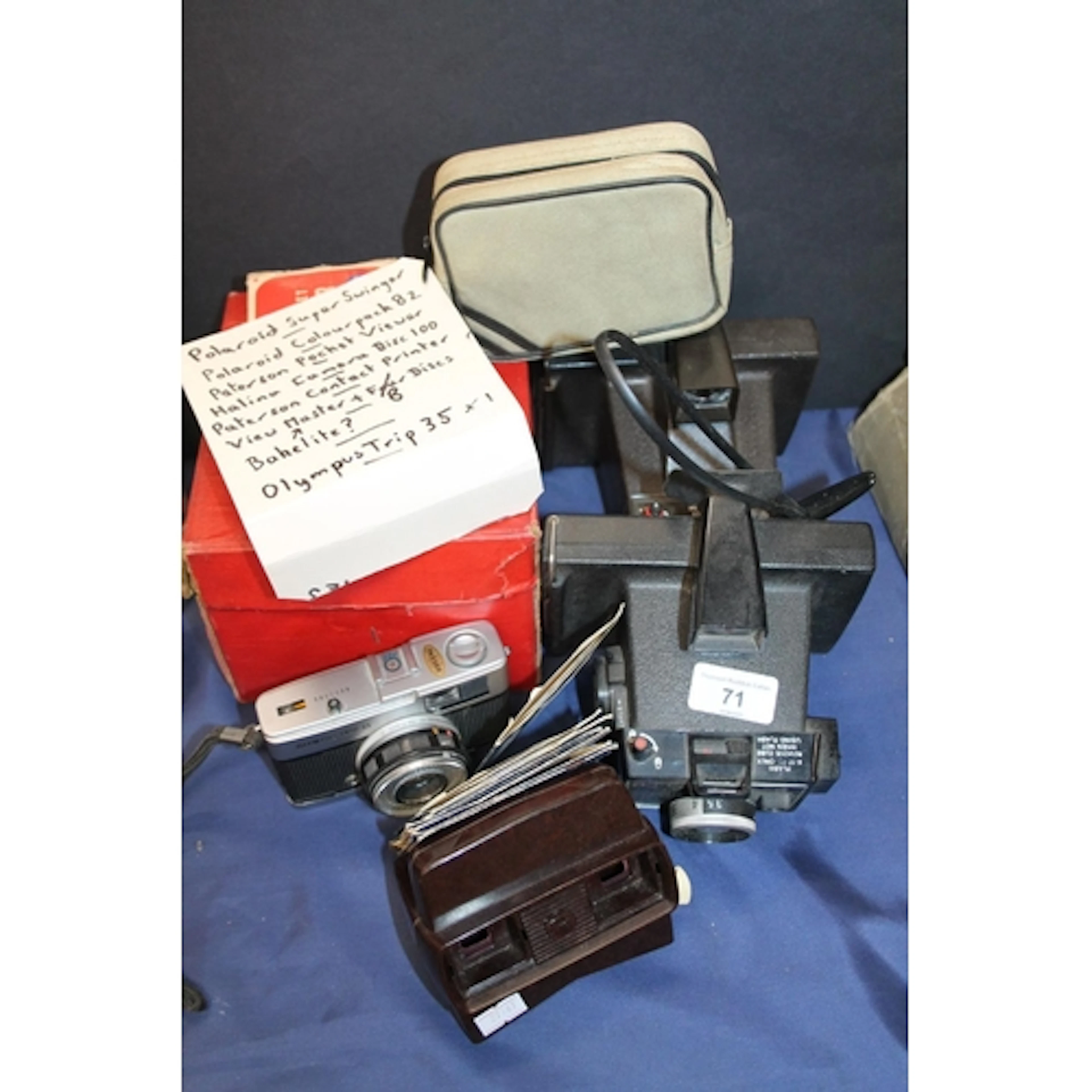 Cameras and photographic accessories to include a Polaroid S...