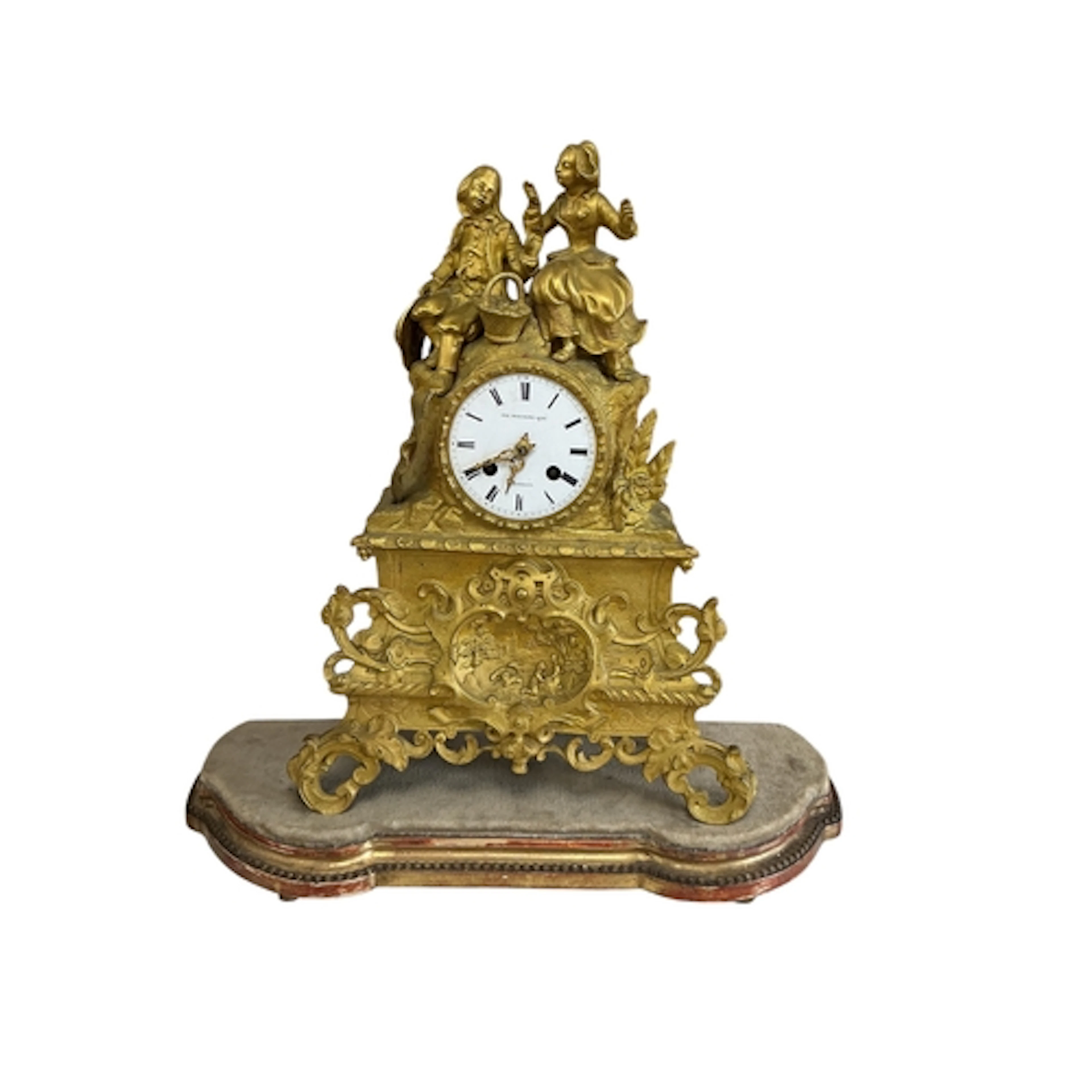 A 19th century French gilt metal mantel clock with figural s...