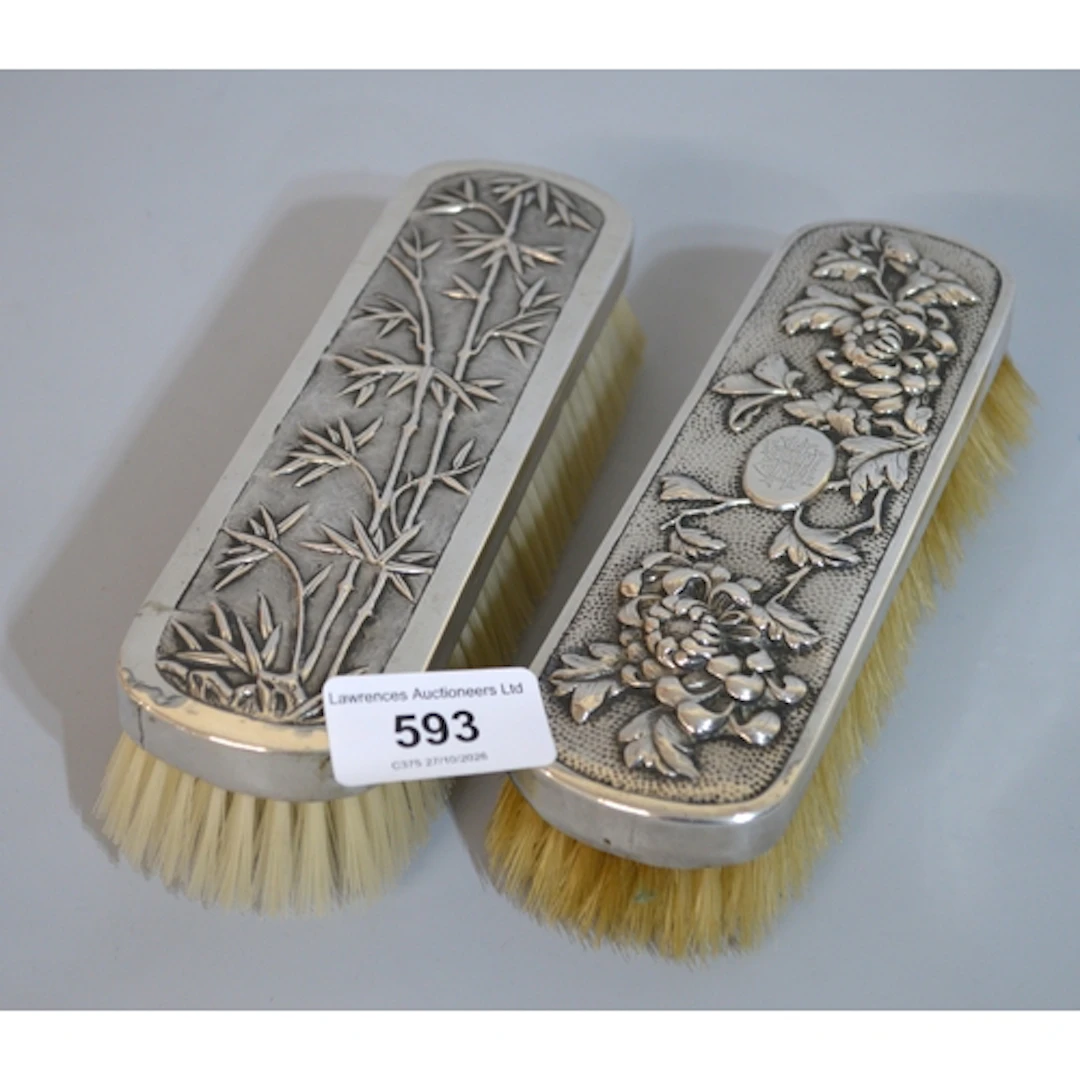 Pair of Chinese silver mounted hairbrushes, relief decorated...