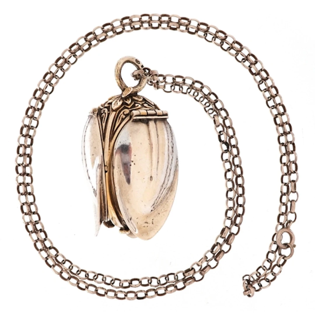 Wyler, Elizabeth II silver fob watch in the form of an openi...