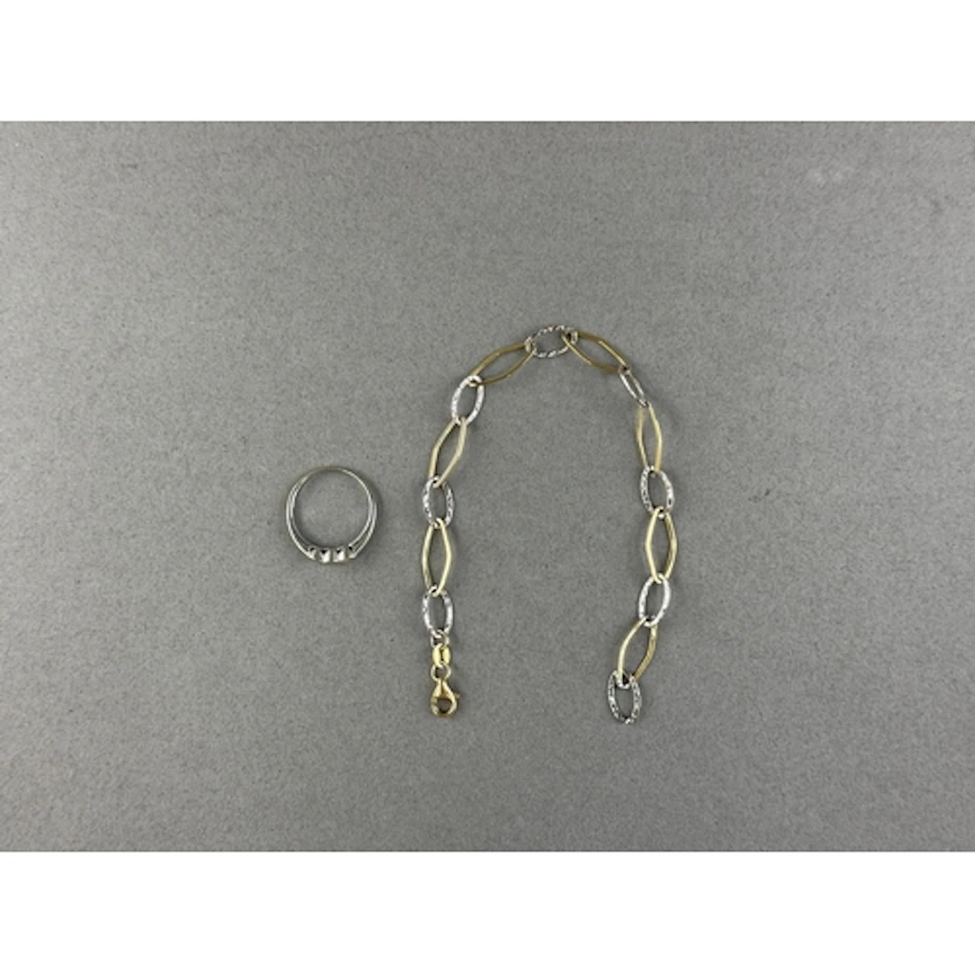 Jewellery: White metal ring, rub over set with three brillia...
