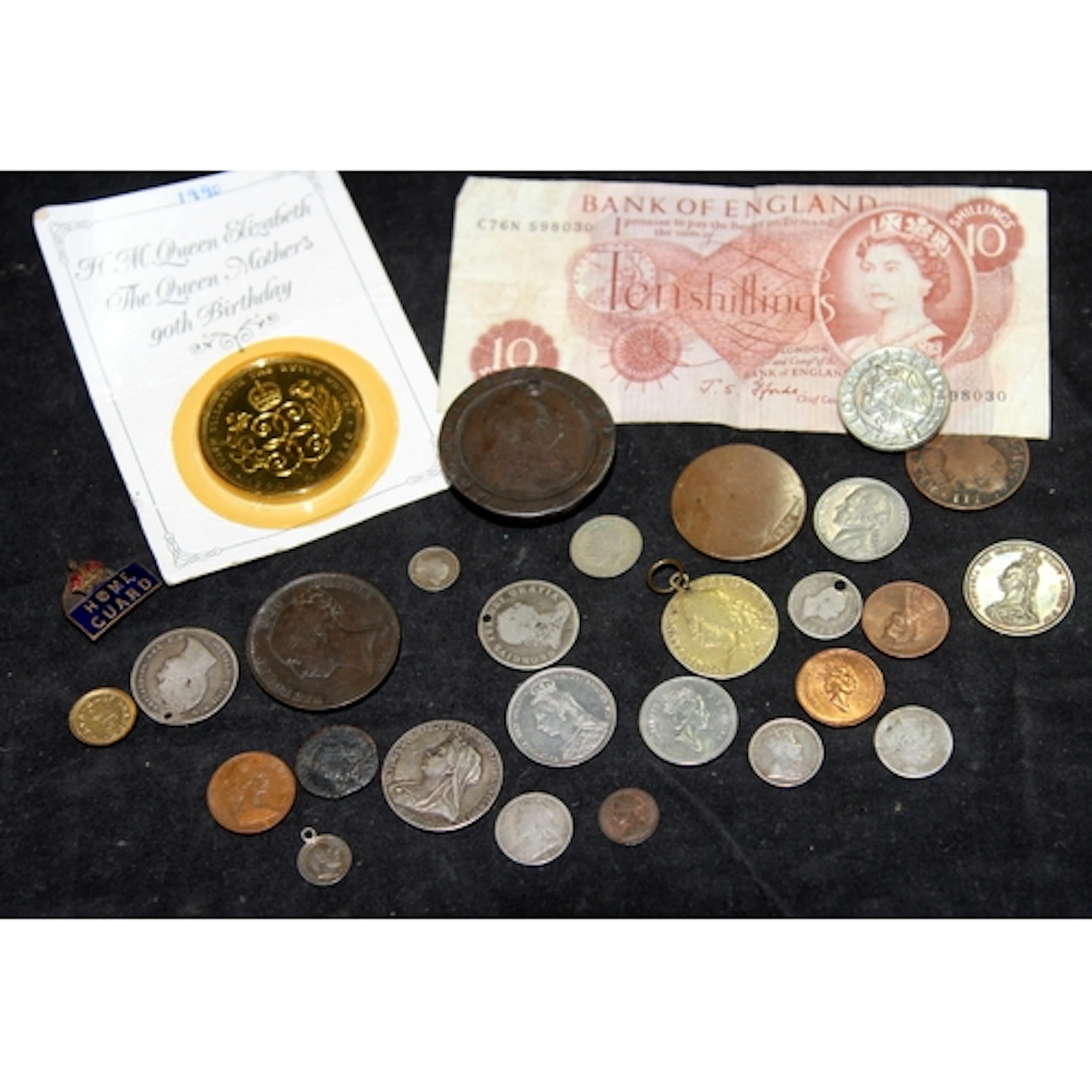A small collection of coins and notes, some interesting exam...