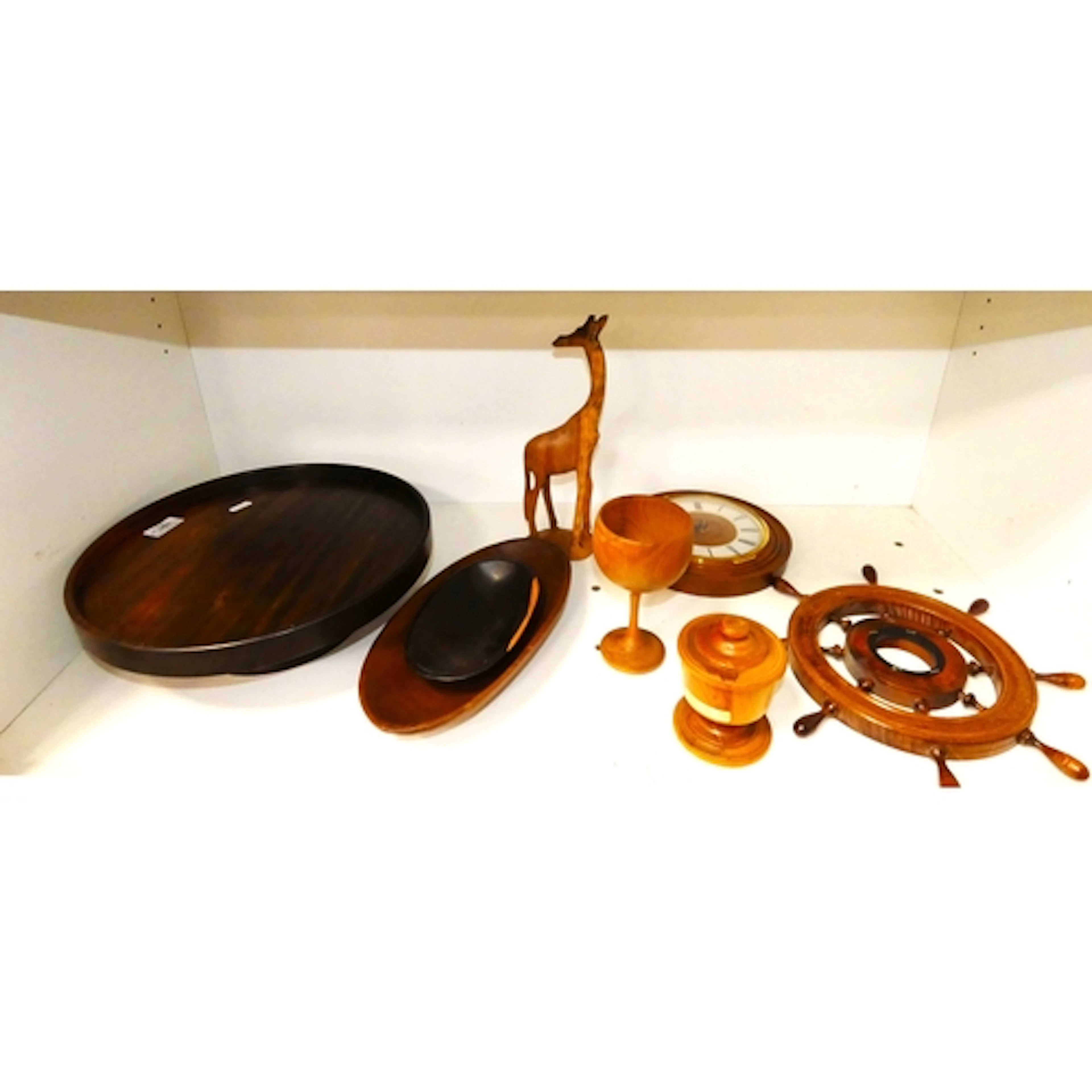 Shelf lot of treen and wood items to include lazy susan, gob...