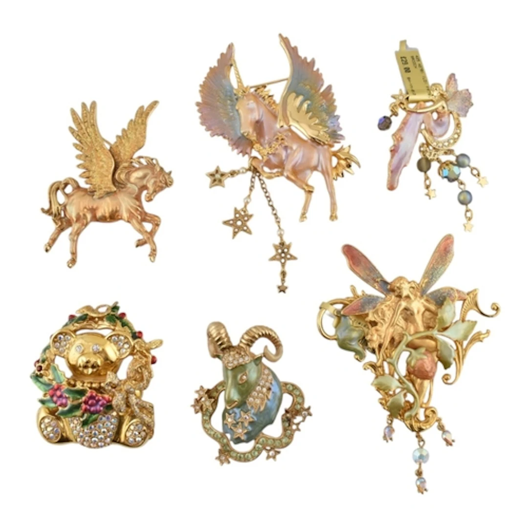 A selection of six Kirks Folly fairy and animal brooch pins....