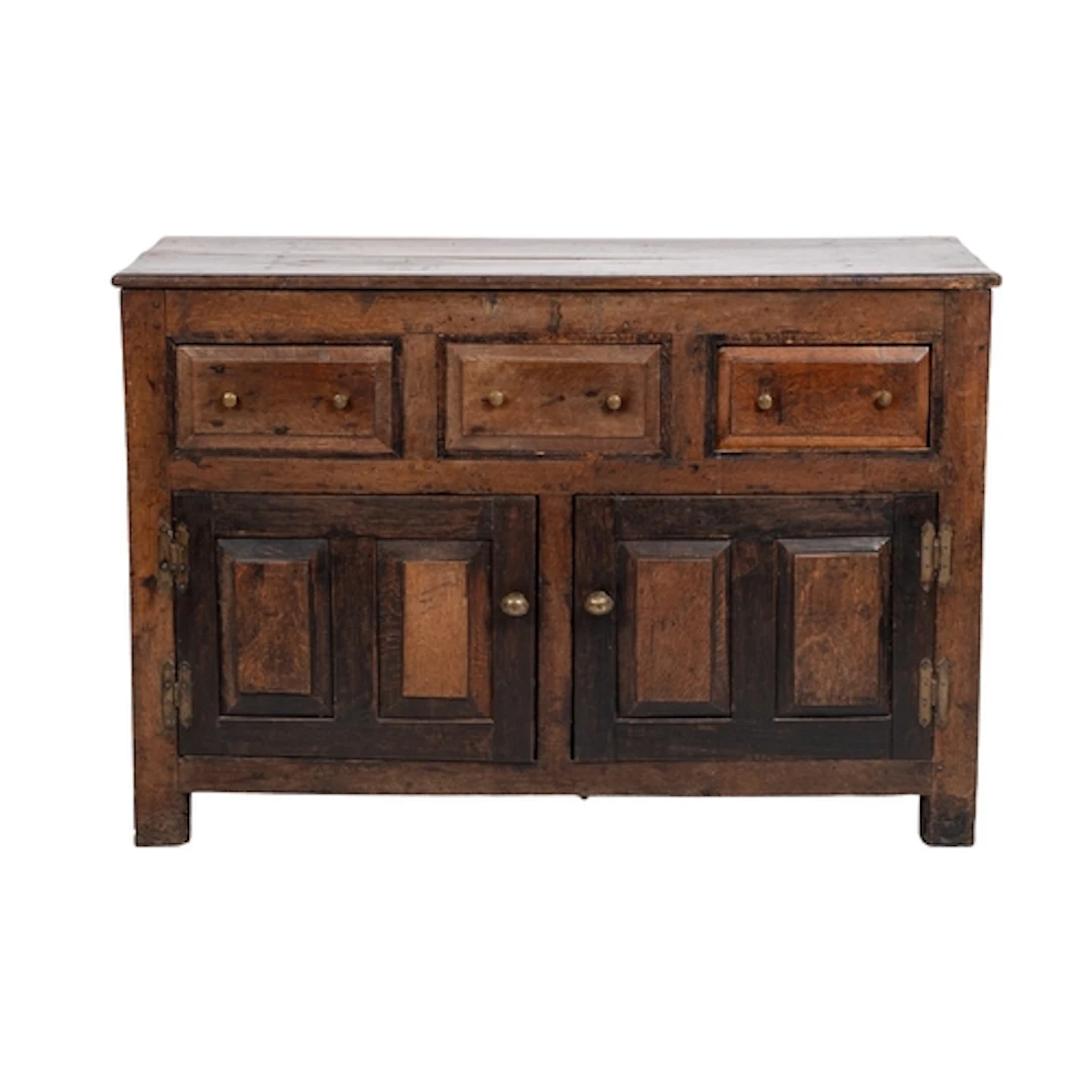 An oak dresser, basically early 18th century; the front with...