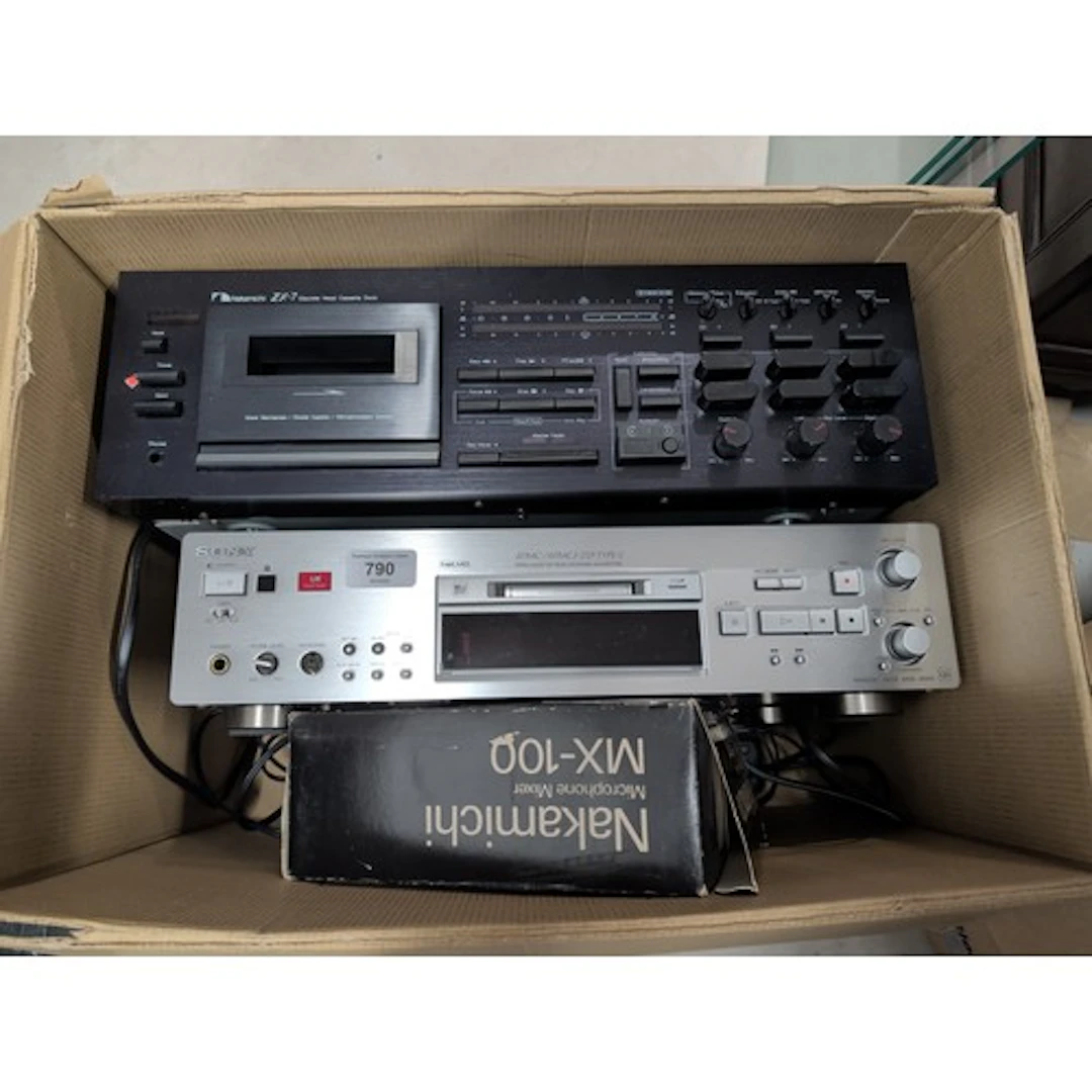 Box containing Nakamichi cassette deck, microphone mixer and...