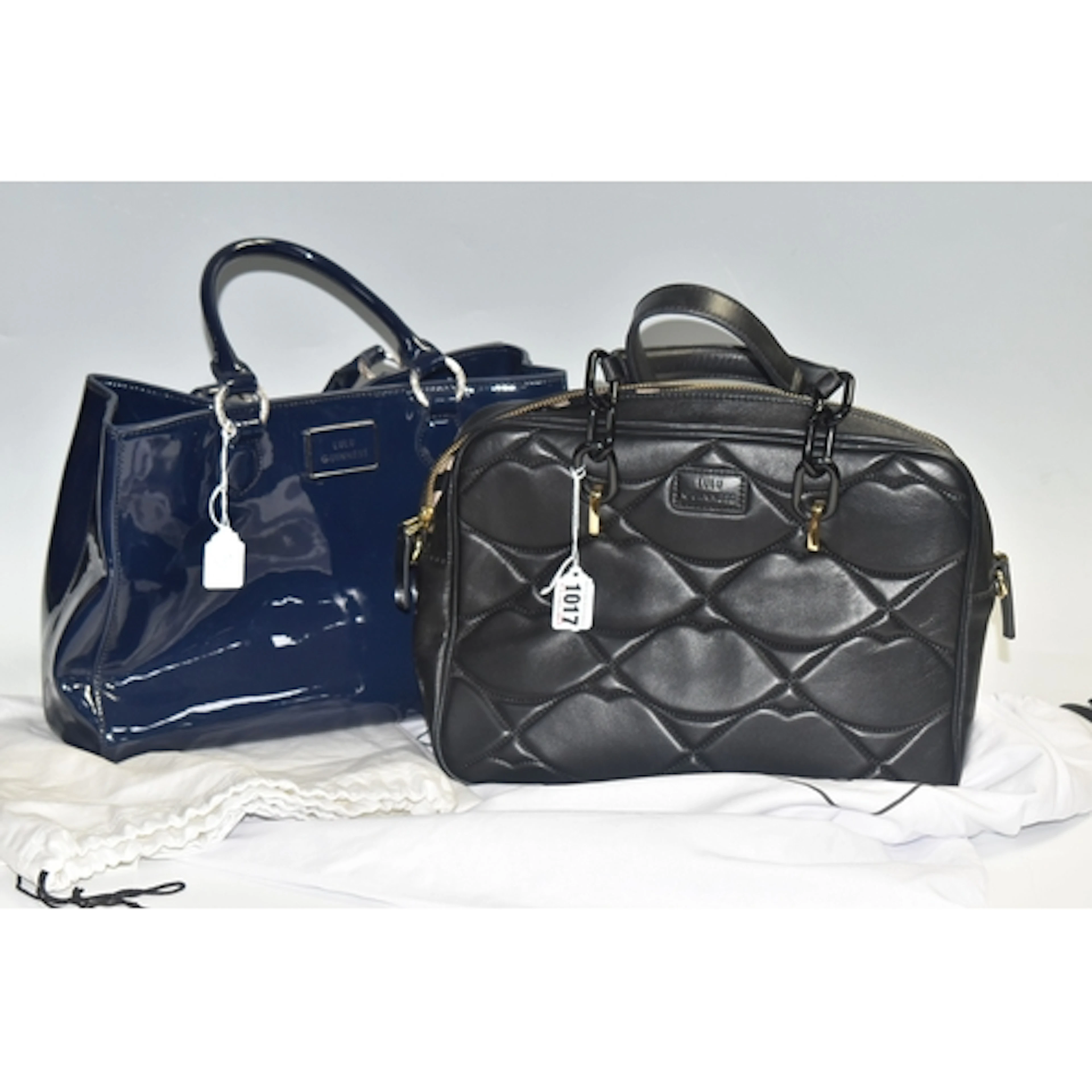 TWO LULU GUINNESS HANDBAGS, comprising design Jenny a black...