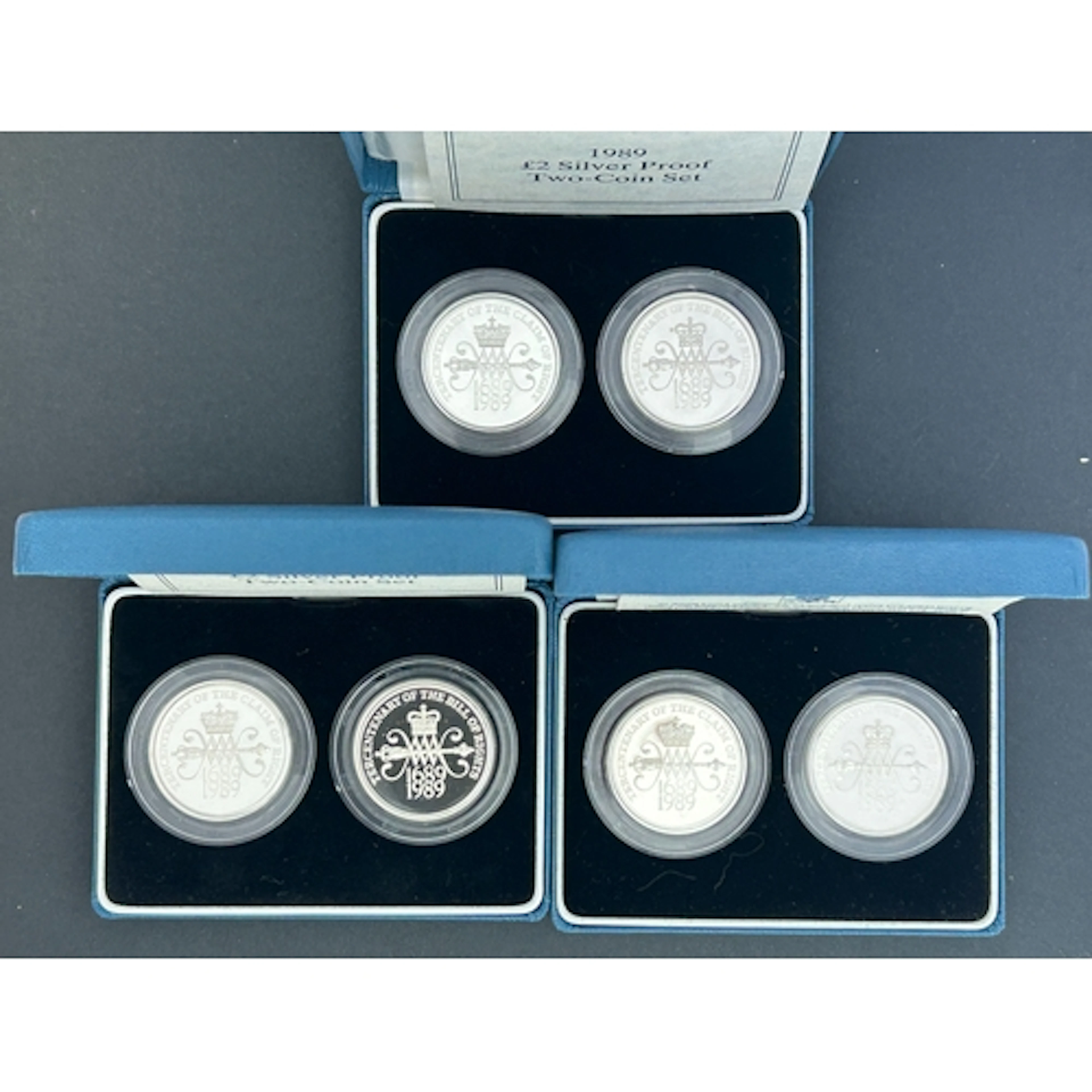 1989 UK QEII silver proof £2 two-coin sets x3, each comprisi...
