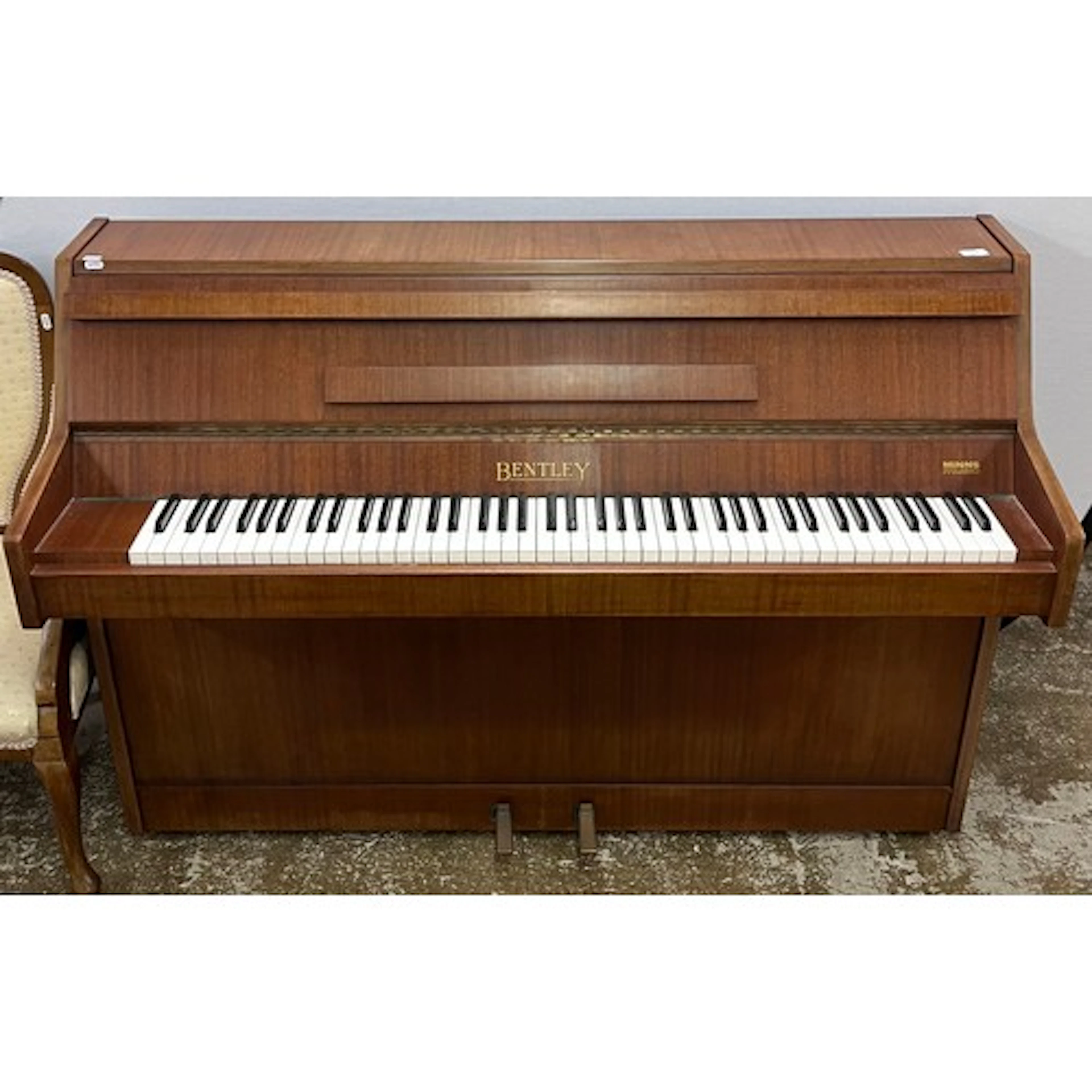Bentley Minns Music upright piano.