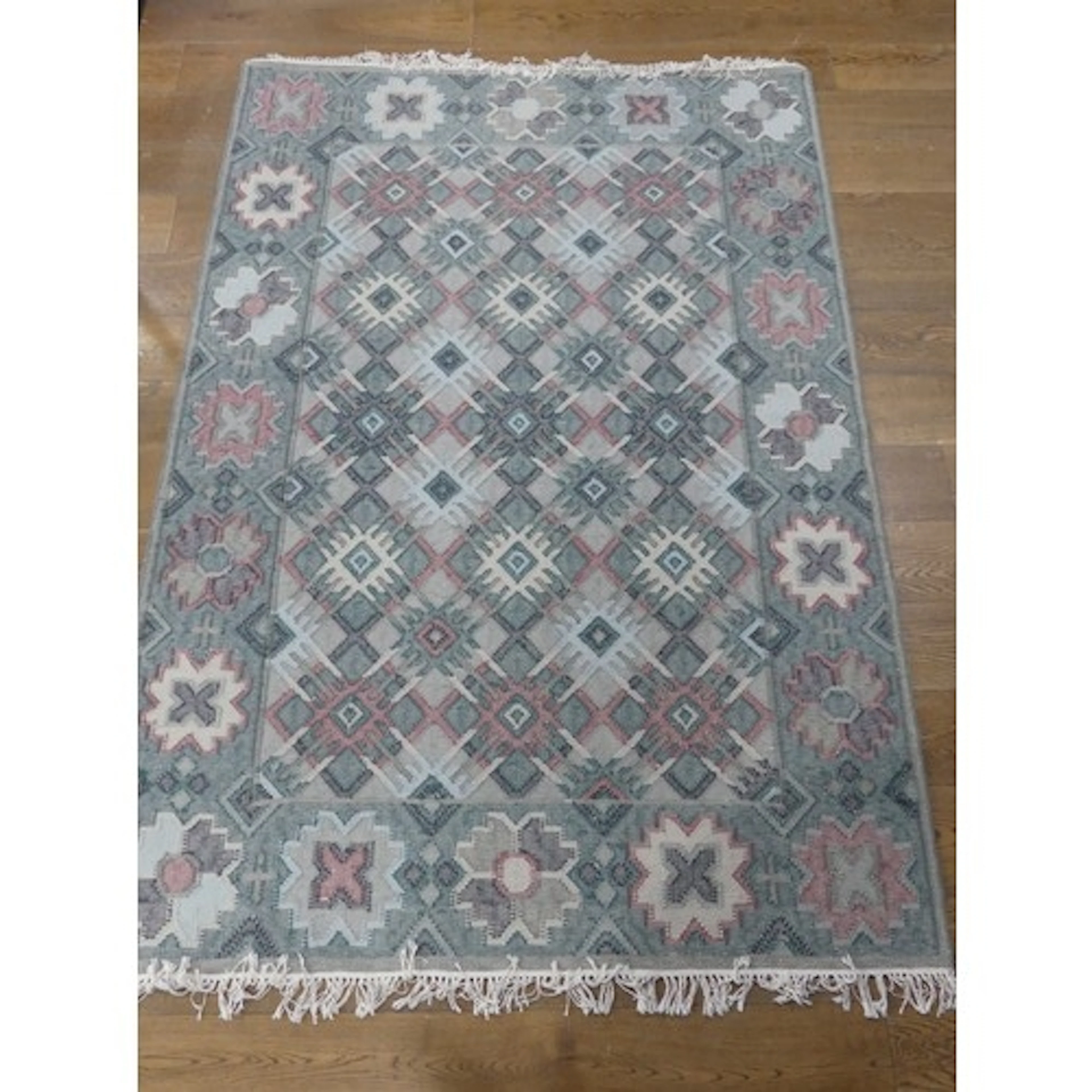A modern decorative flatweave grey-green Rug, cotton base wi...