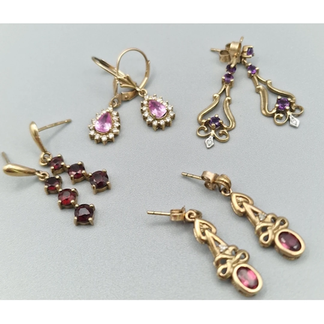 Four pairs of 9ct gold earrings set with semi-precious stone...
