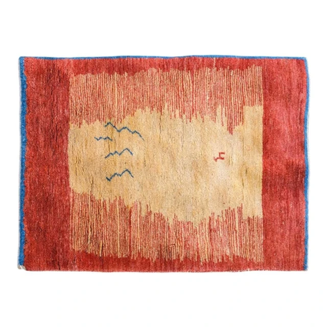 A Gabbeh rug. 100% wool pile, depicting a sunset with a cent...