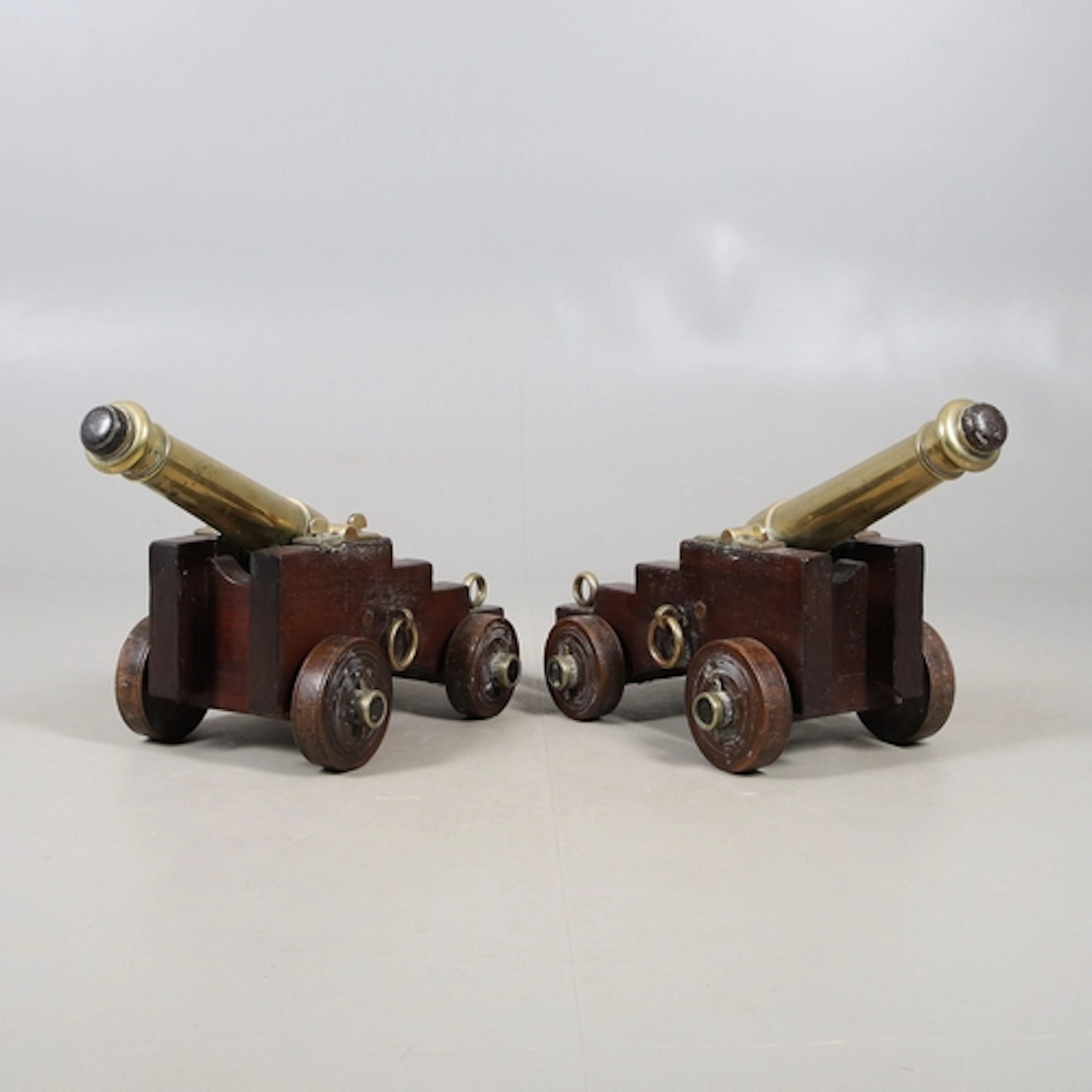 A FINE PAIR OF EARLY NINETEENTH CENTURY BRONZE FALCONET OR D...
