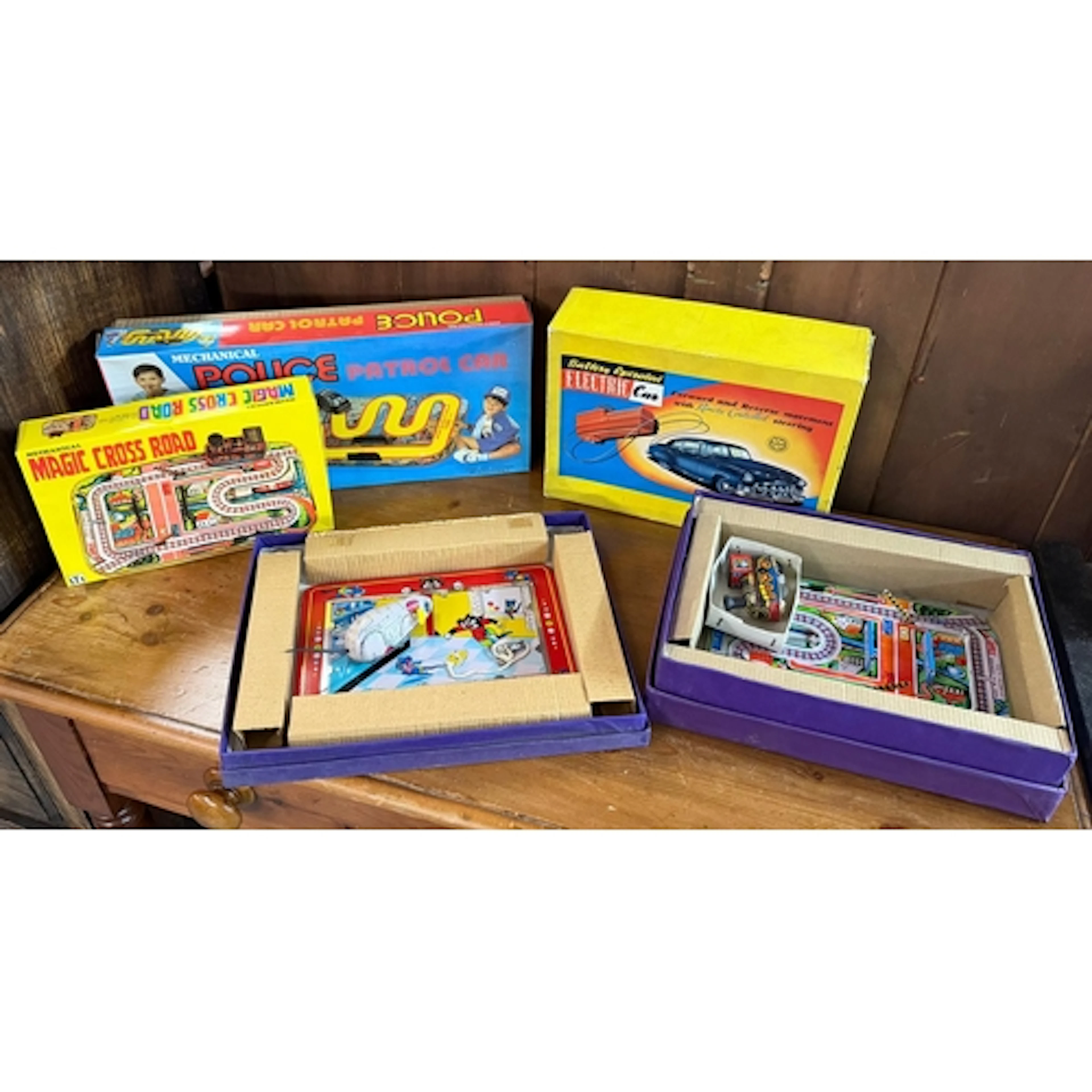 Collection of vintage mechanical tinplate and battery operat...