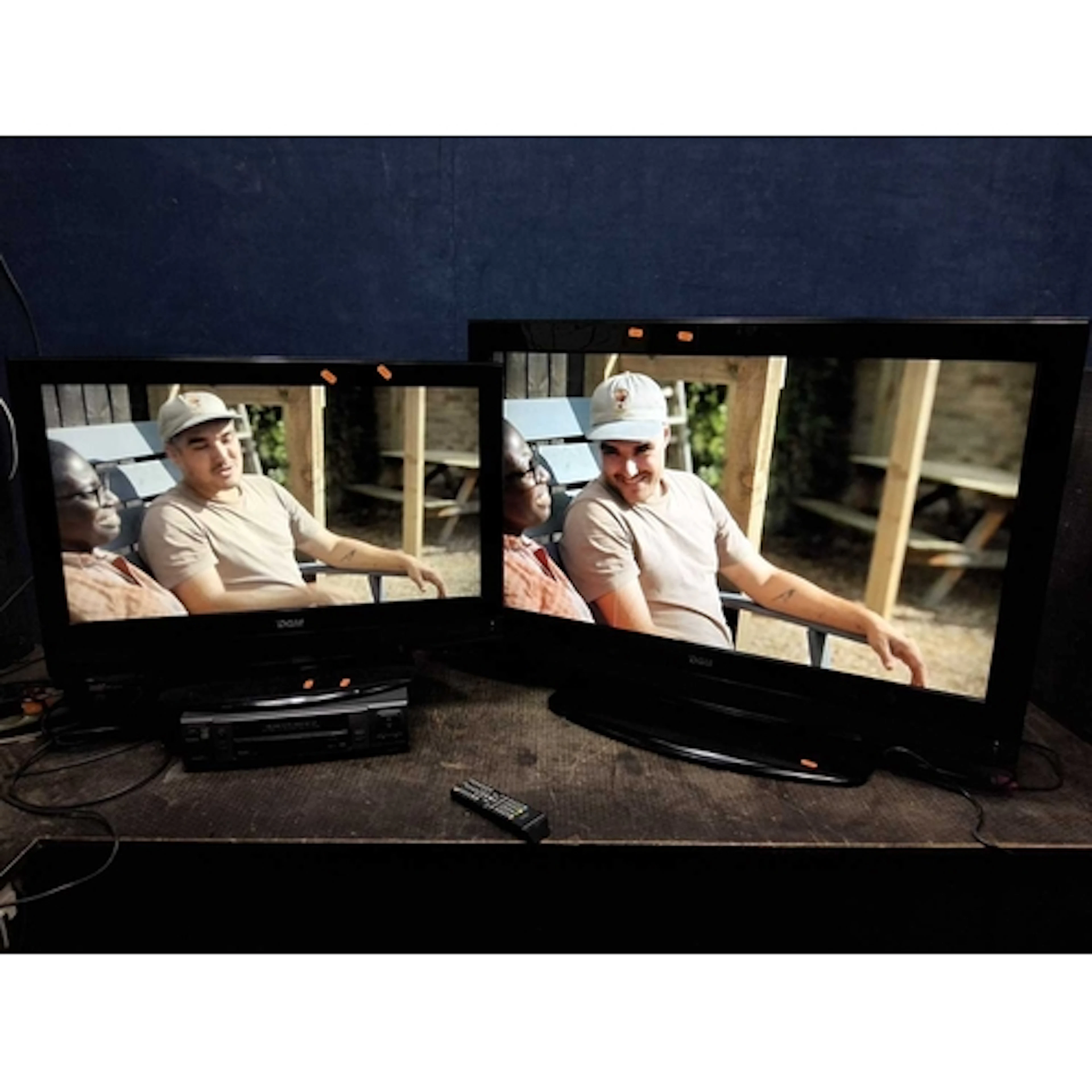 TWO DGM TVs including a 42in (line to screen), a 32in (both ...