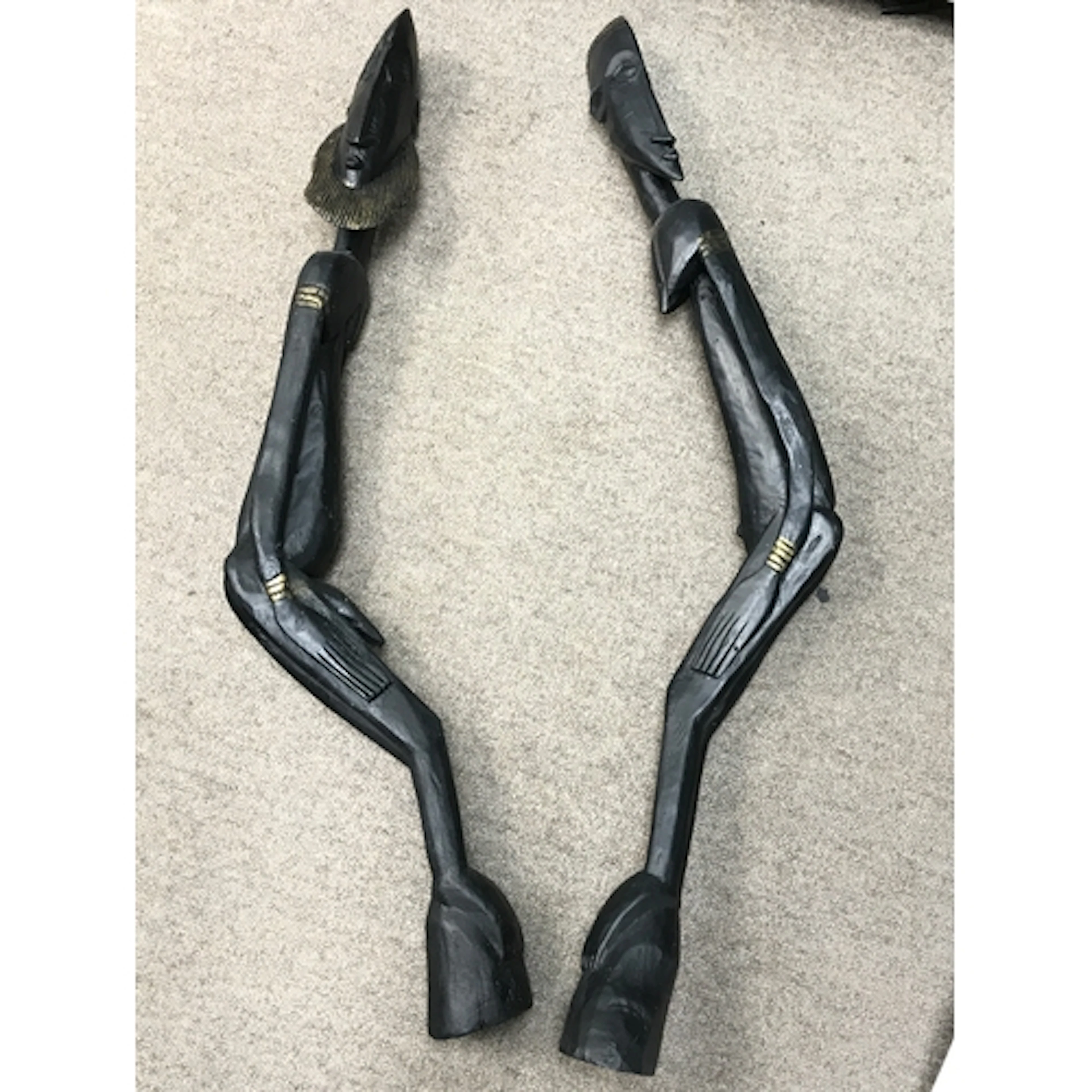 A pair of large hand carved wooden African figures 98cm tall...