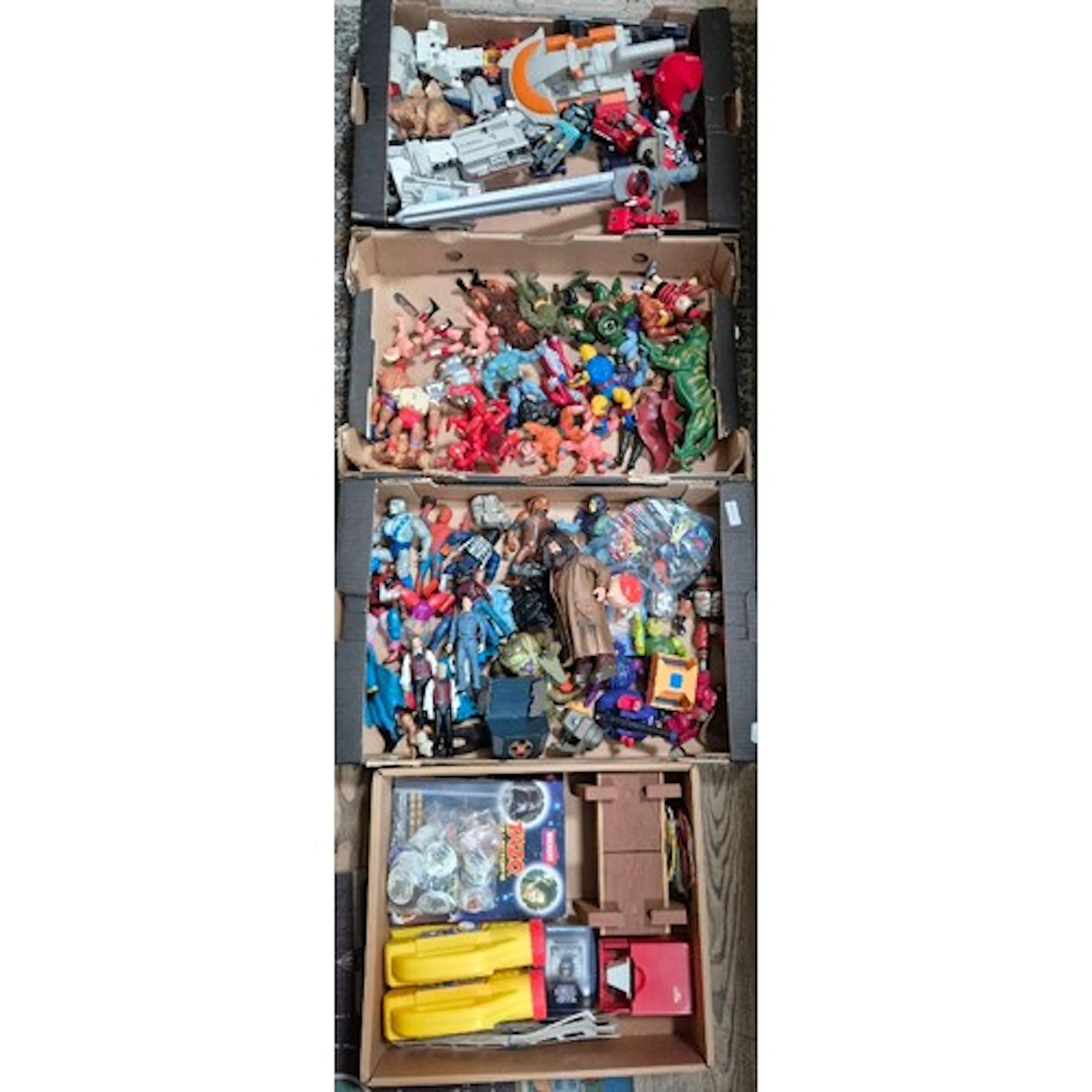 Four boxes of assorted vintage toys to include Thundercats &...