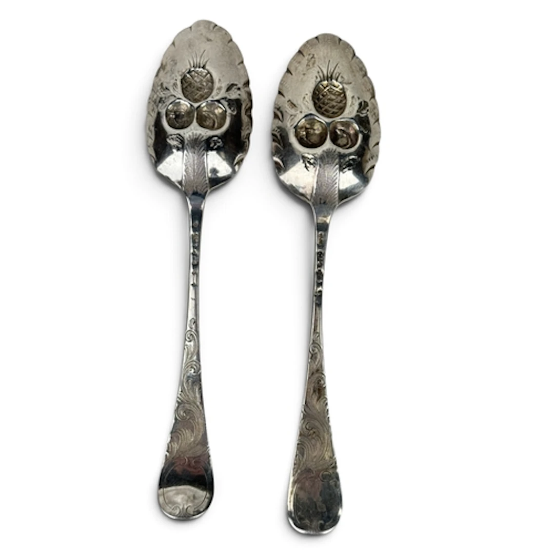 A PAIR OF GEORGE III SILVER TABLESPOONS, LATER EMBOSSED IN '...