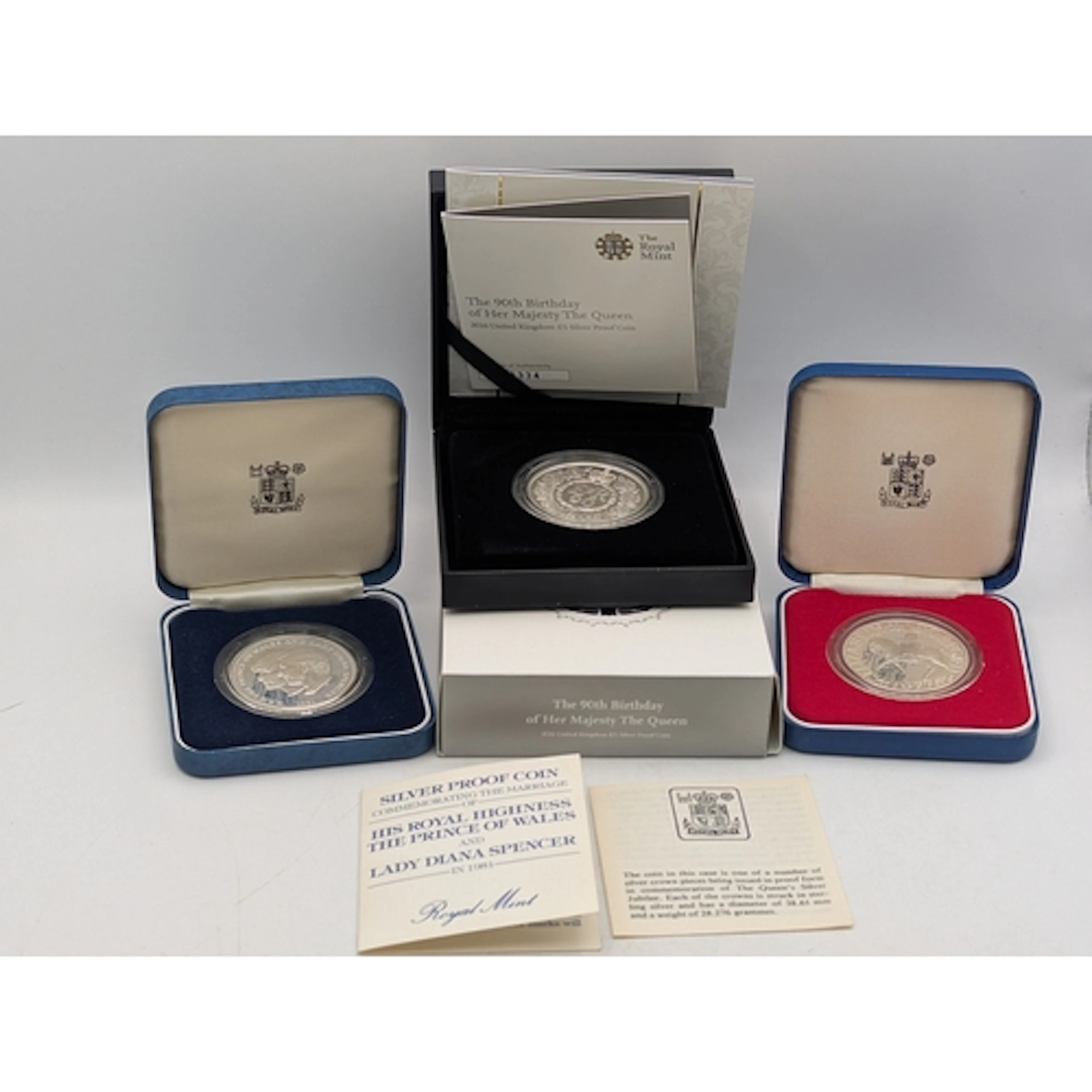 Three silver proof British commemorative coins to include a ...