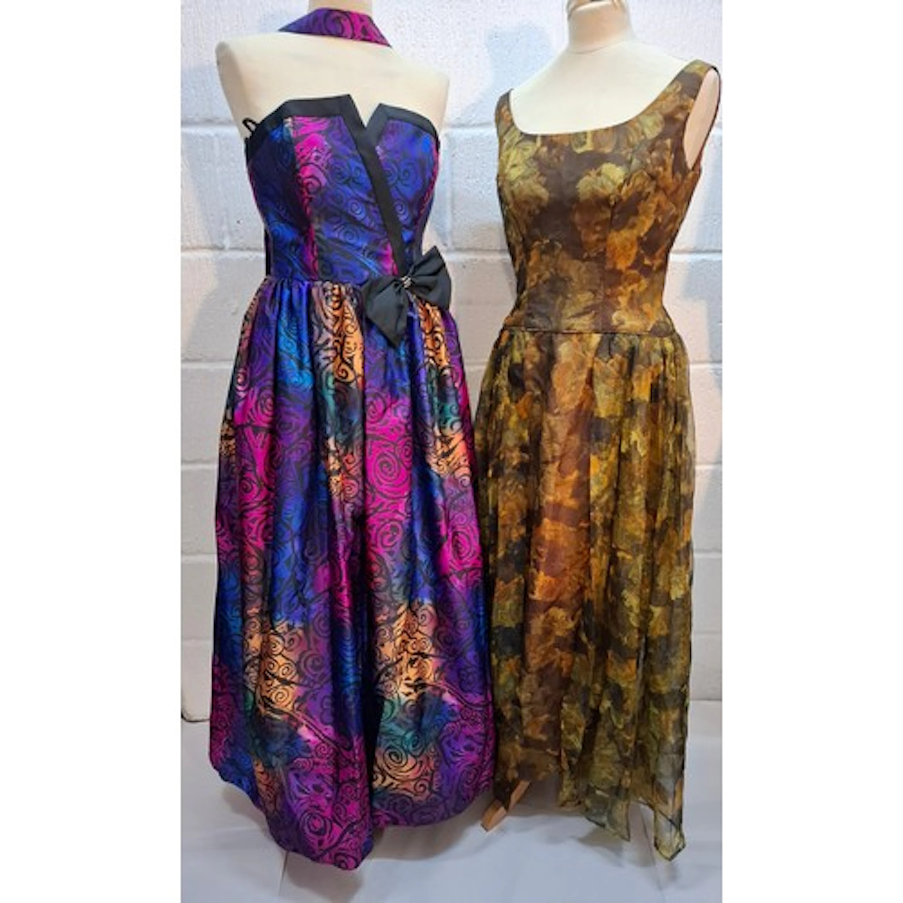 A mixed fashion and decorative lot comprising 2 evening gown...