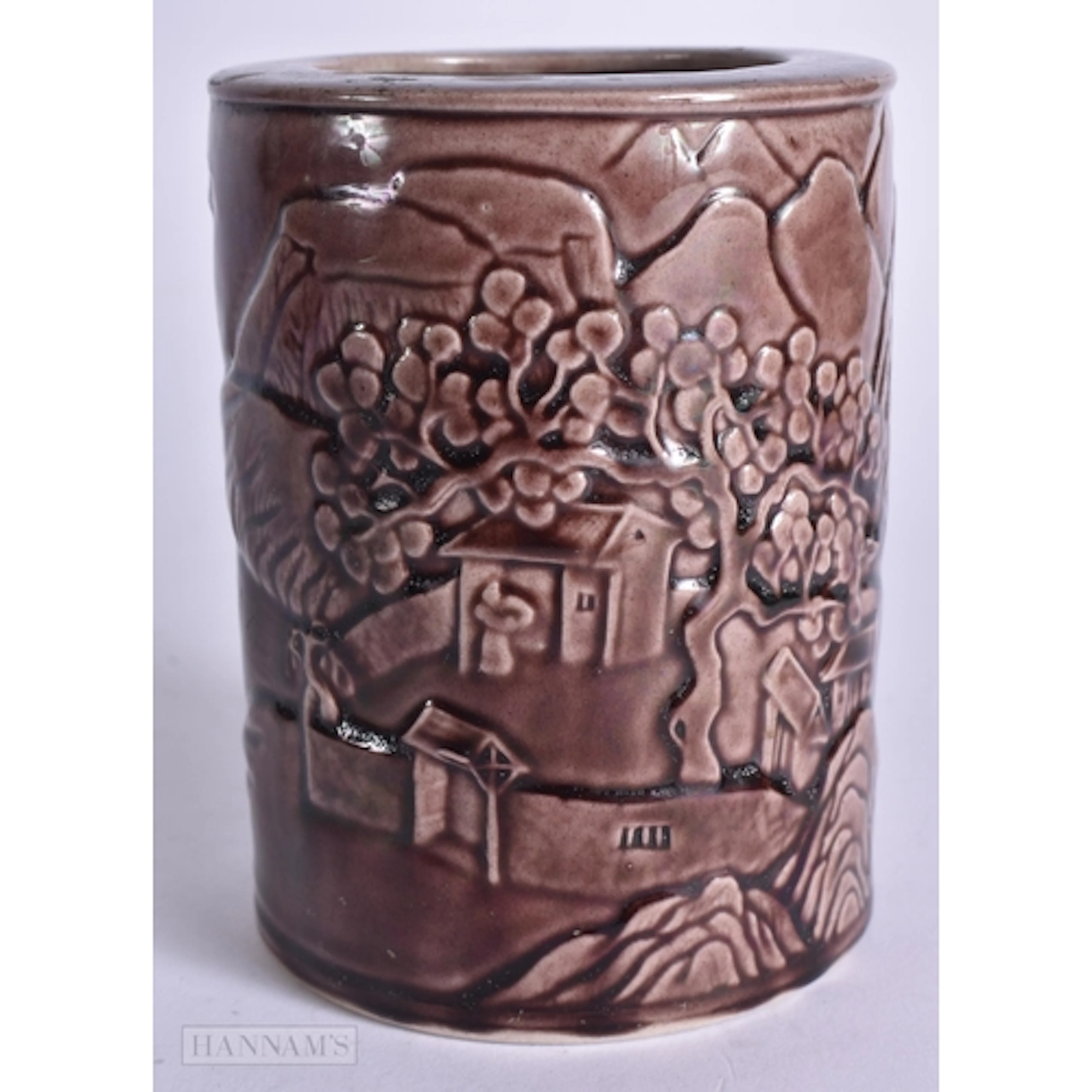 AN EARLY 20TH CENTURY CHINESE AUBERGINE GLAZED MOULDED PORCE...