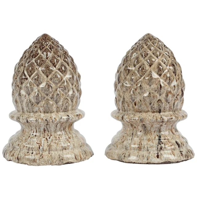 A pair of marbled majolica pineapple finials, early 20th ce...