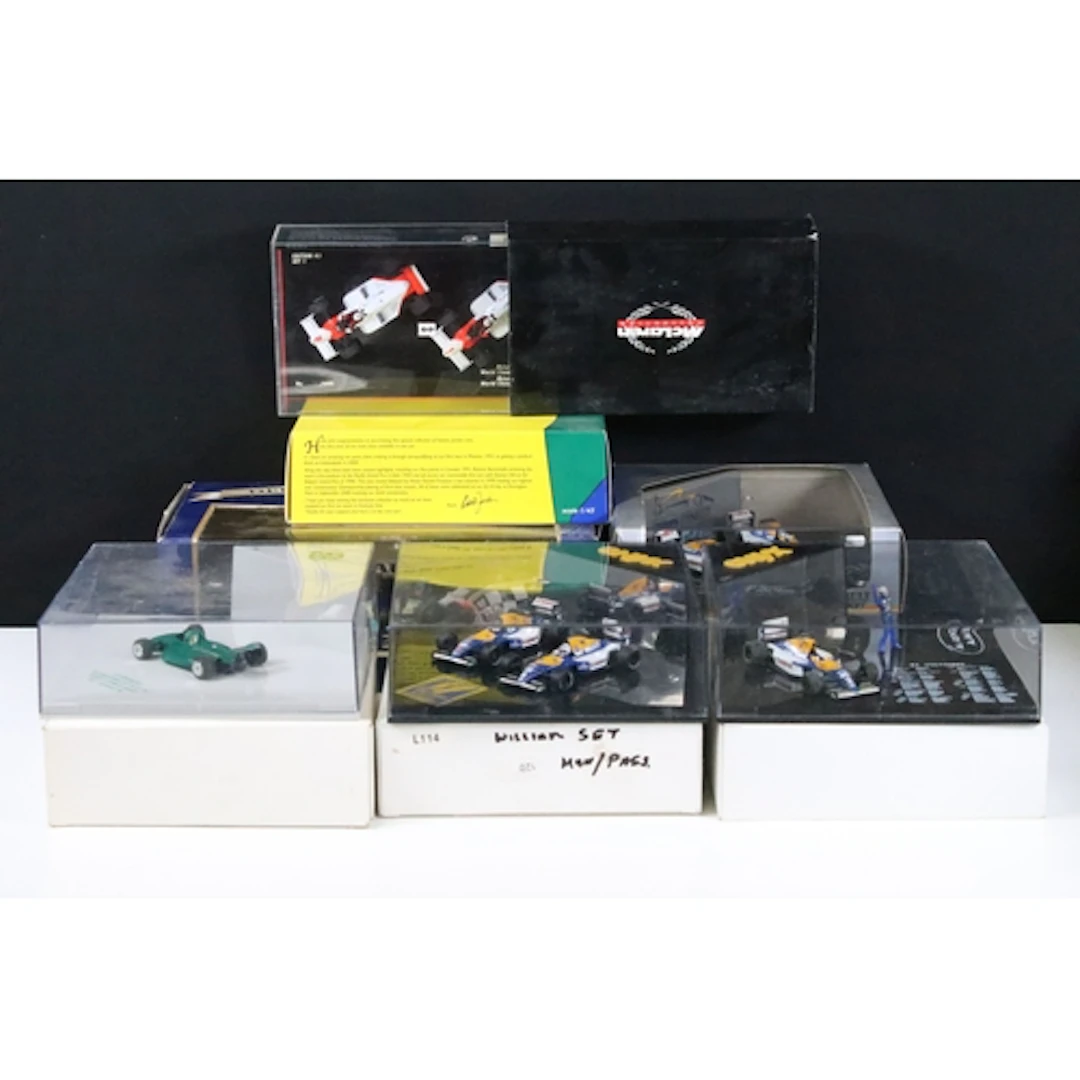 Eight boxed / cased racing related diecast models and sets t...