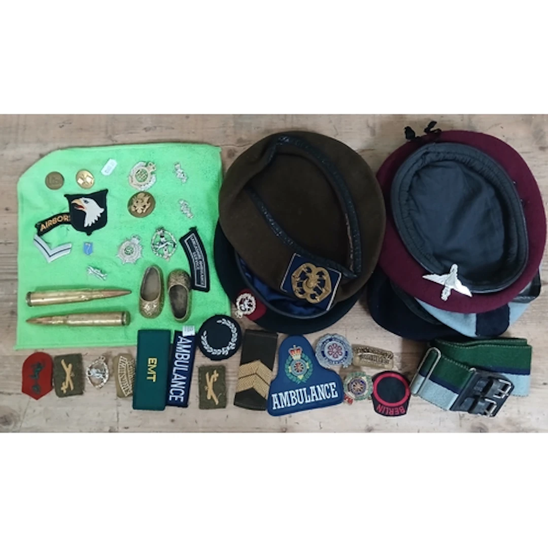 Assorted military caps and badges etc.