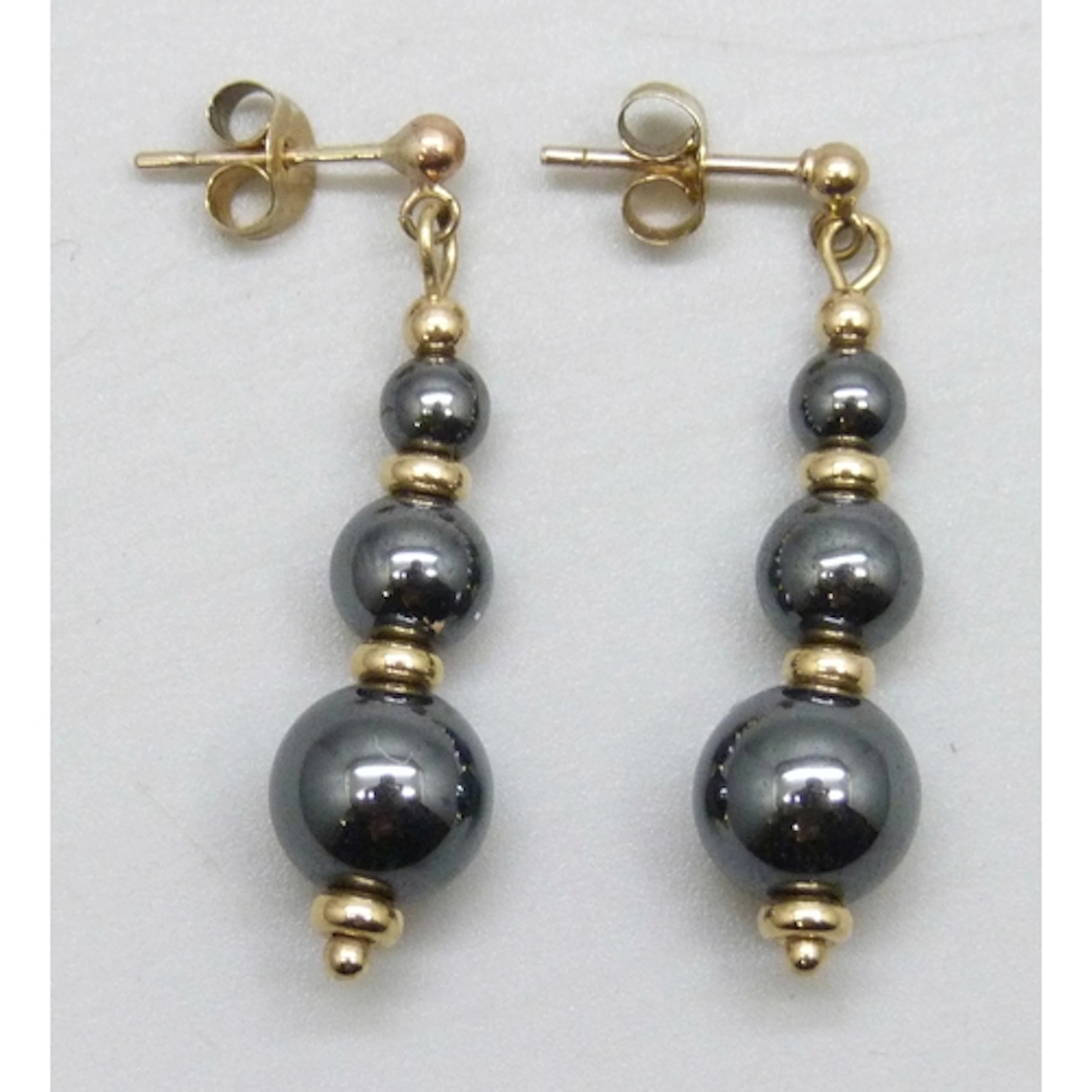 A pair of 9ct gold mounted hematite drop earrings, 5.2g