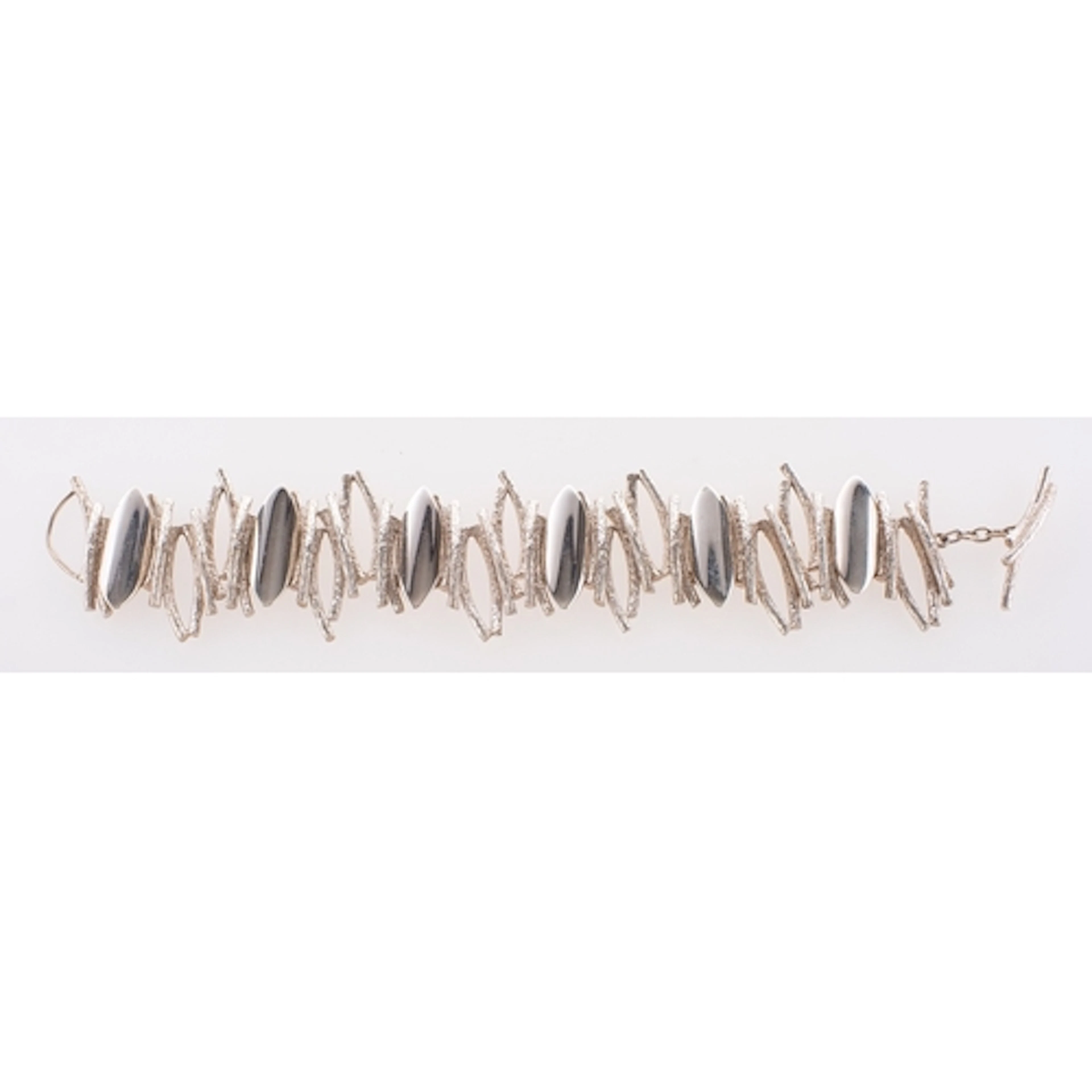 A hallmarked silver bracelet, length approximately 185.00mm ...