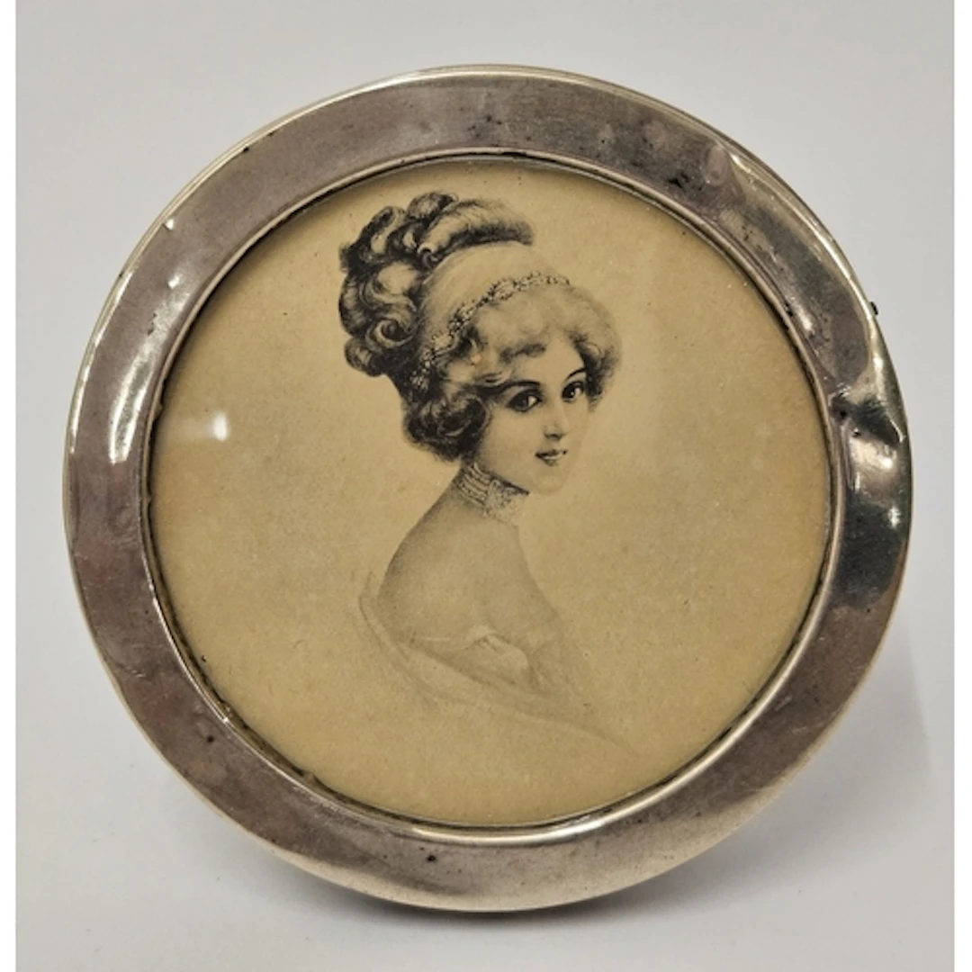 Circular Hallmarked Silver Picture Frame enclosing black & w...