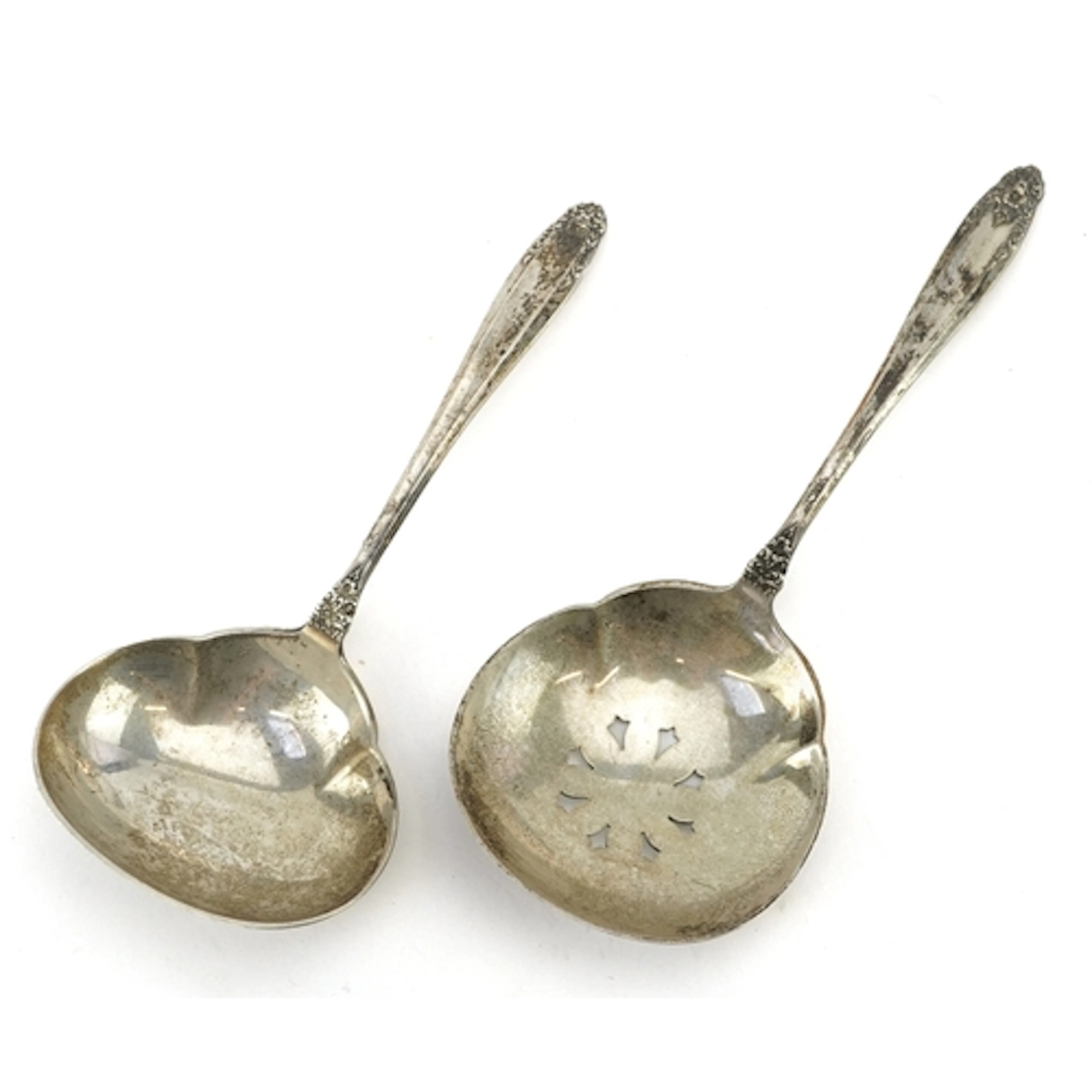 Two Prelude sterling silver caddy spoons, the largest 12cm i...