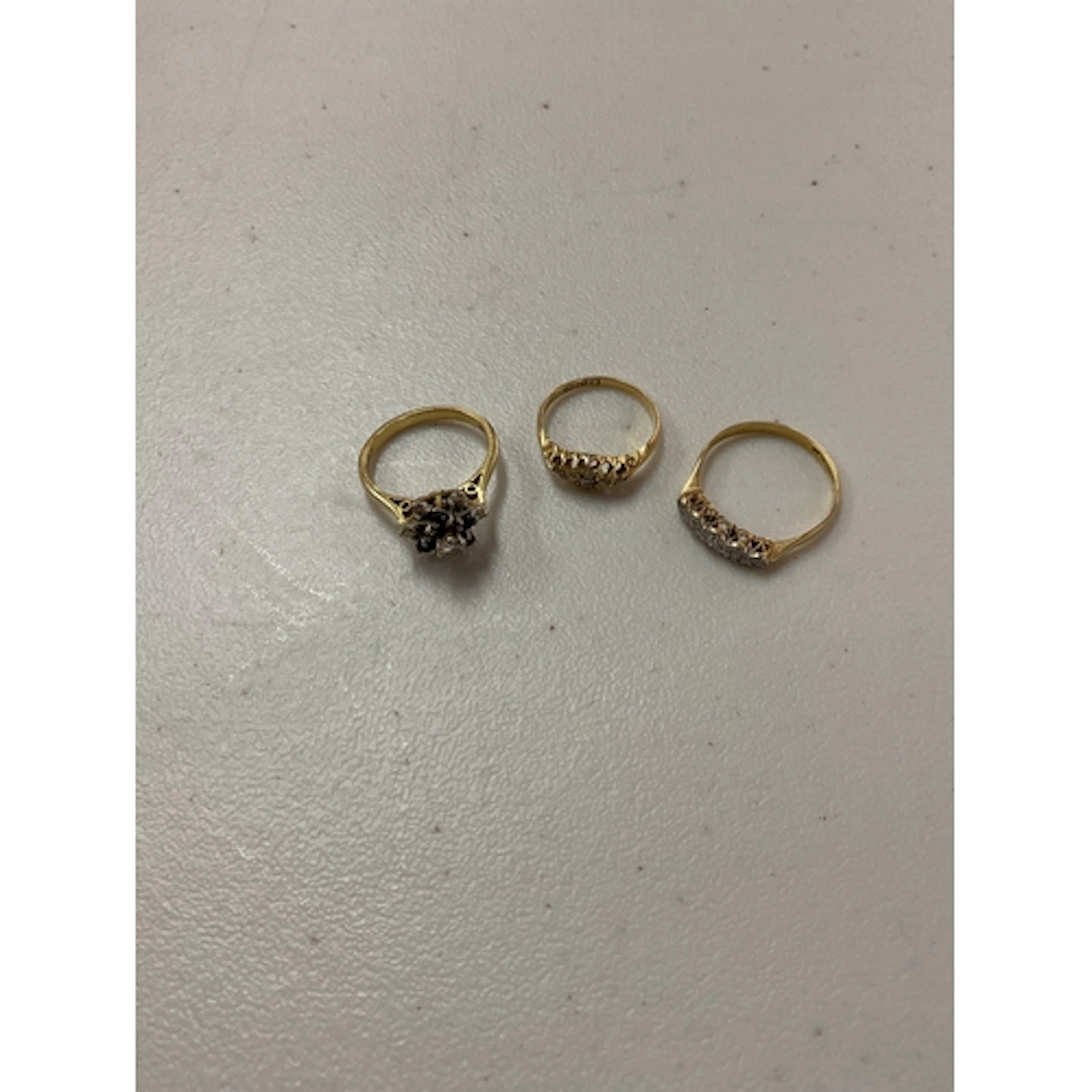 Three 18 ct Diamond rings. Weight 9 grams.