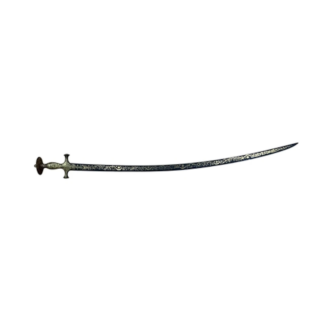 An 19th century Indian tulwar with curved damascened blade, ...