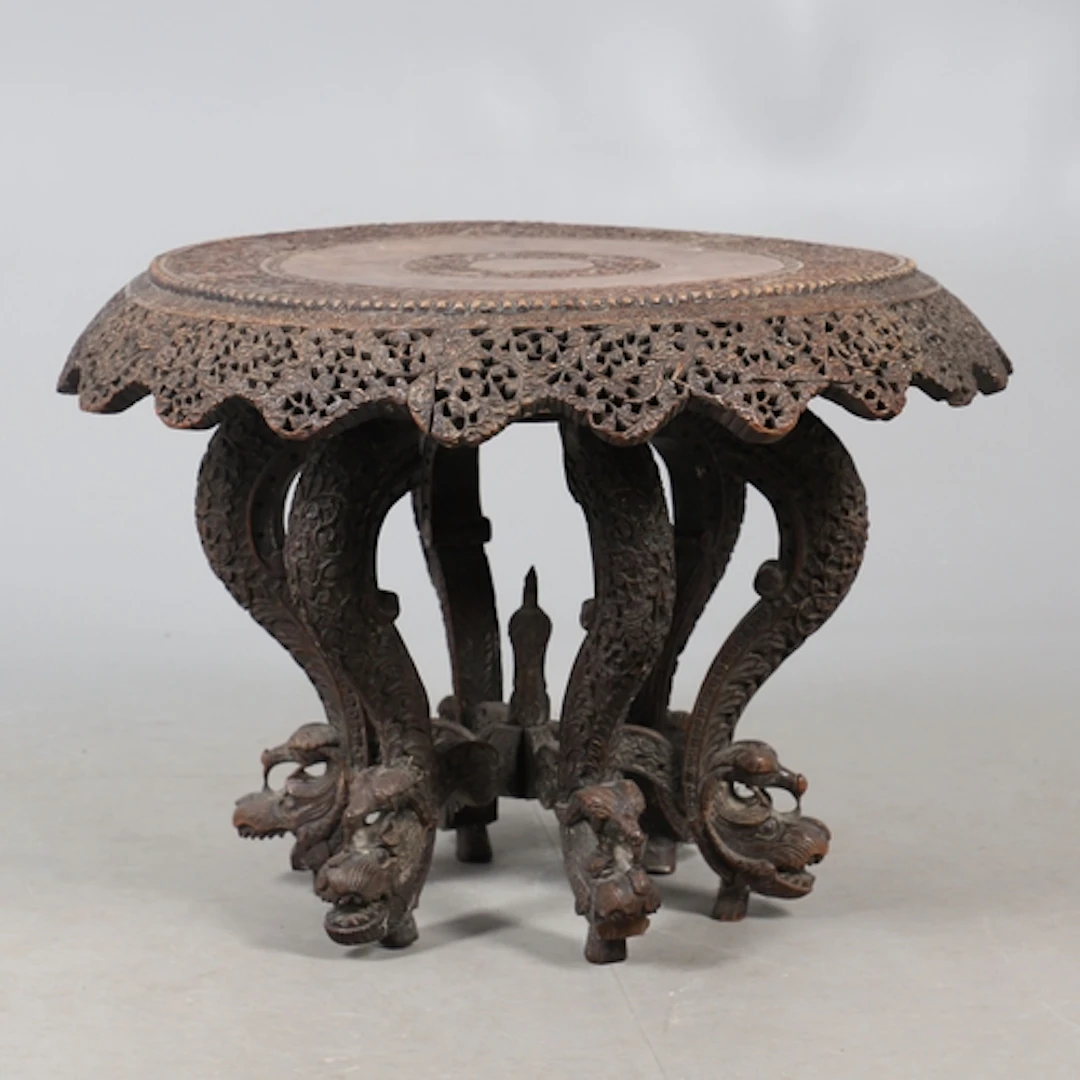 A 19TH CENTURY BURMESE HARDWOOD TIFFIN TABLE. the lazy Susan...
