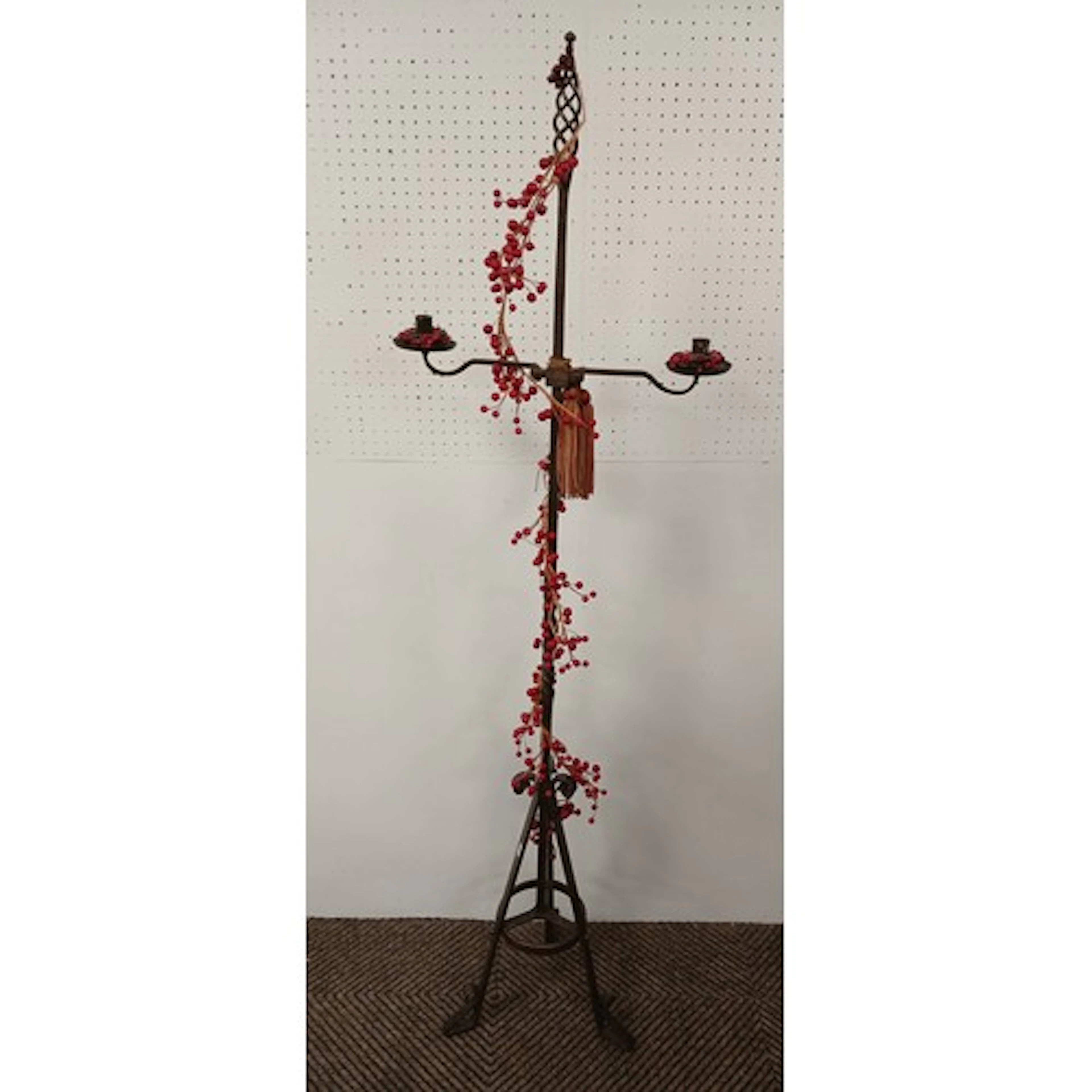 Cast iron floor sconce.