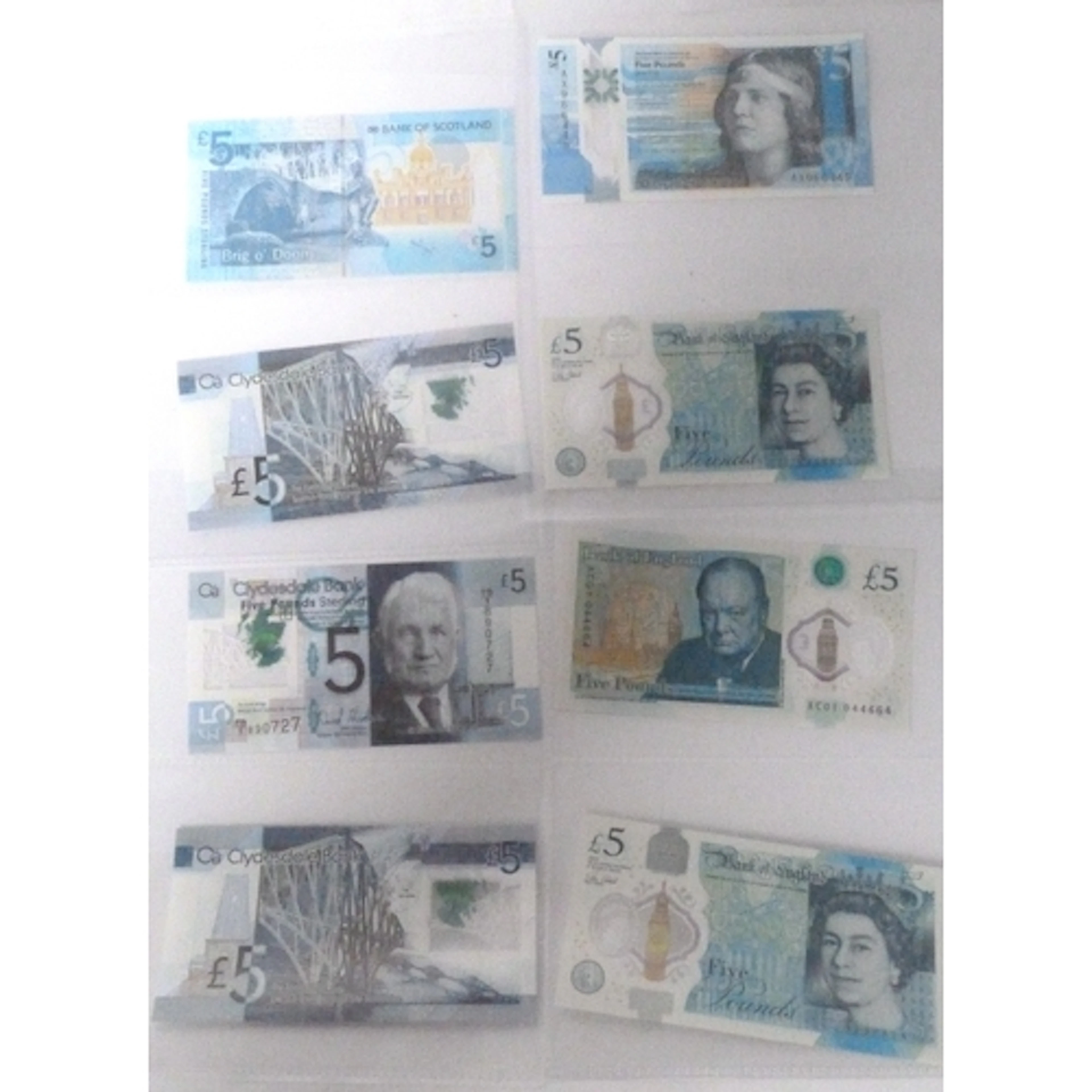 Eight Bank of England and Clydesdale Bank £5 banknotes to in...