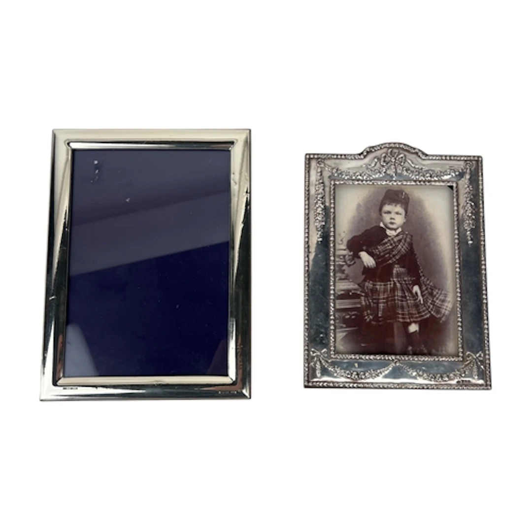 TWO SILVER MOUNTED PICTURE FRAMES Largest 19.5cm x 15.5cm...