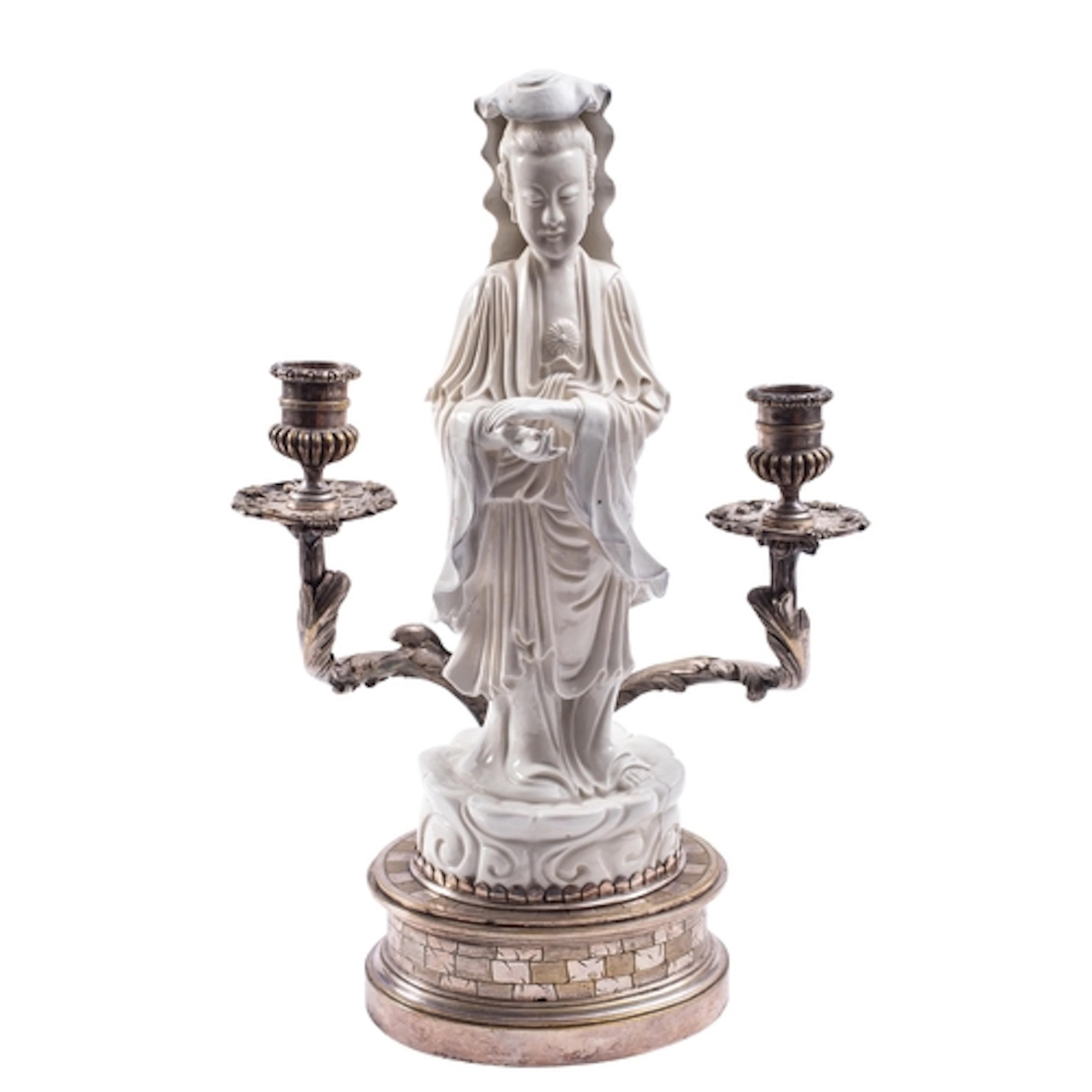 A Chinese Blanc de Chine figure of Guanyin mounted on a two-...